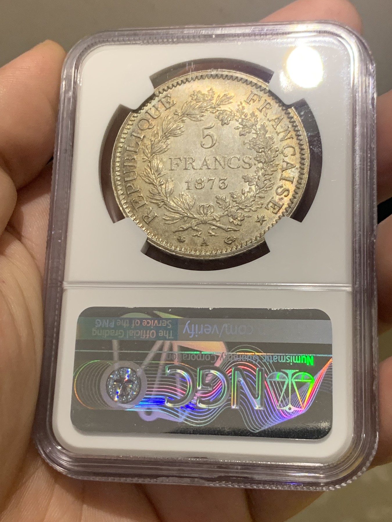 欢迎参加《竞宝斋》为国而庆 老张自藏专场 ，定制纪念章相赠 NGC MS64 法国 1873年 大力神5法郎银币 双面五彩 状态没的说