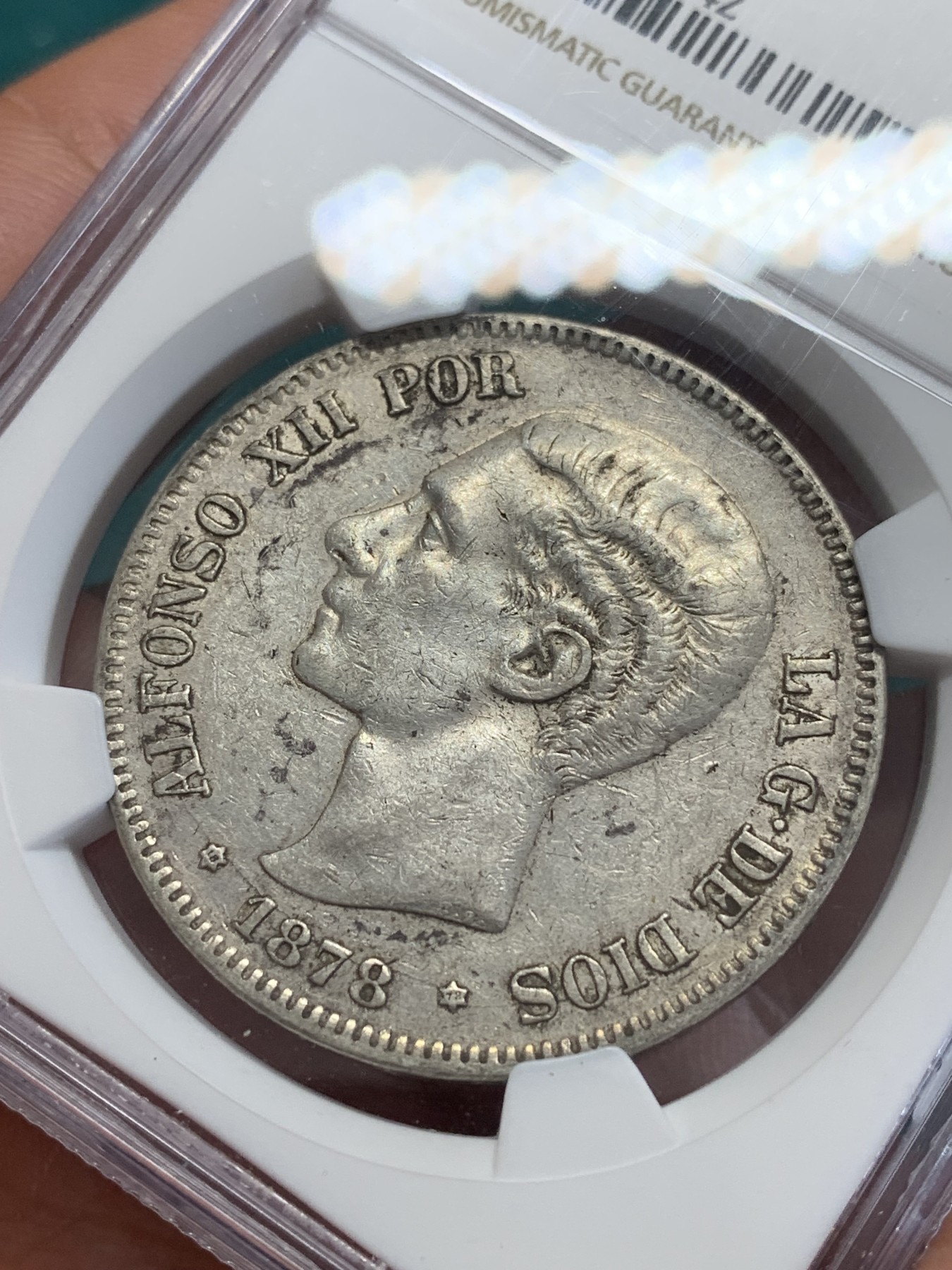 欢迎参加《竞宝斋》为国而庆 老张自藏专场 ，定制纪念章相赠 NGC XF45 西班牙 1878年 阿方索十二世 5比塞塔银币 原味包浆带底光