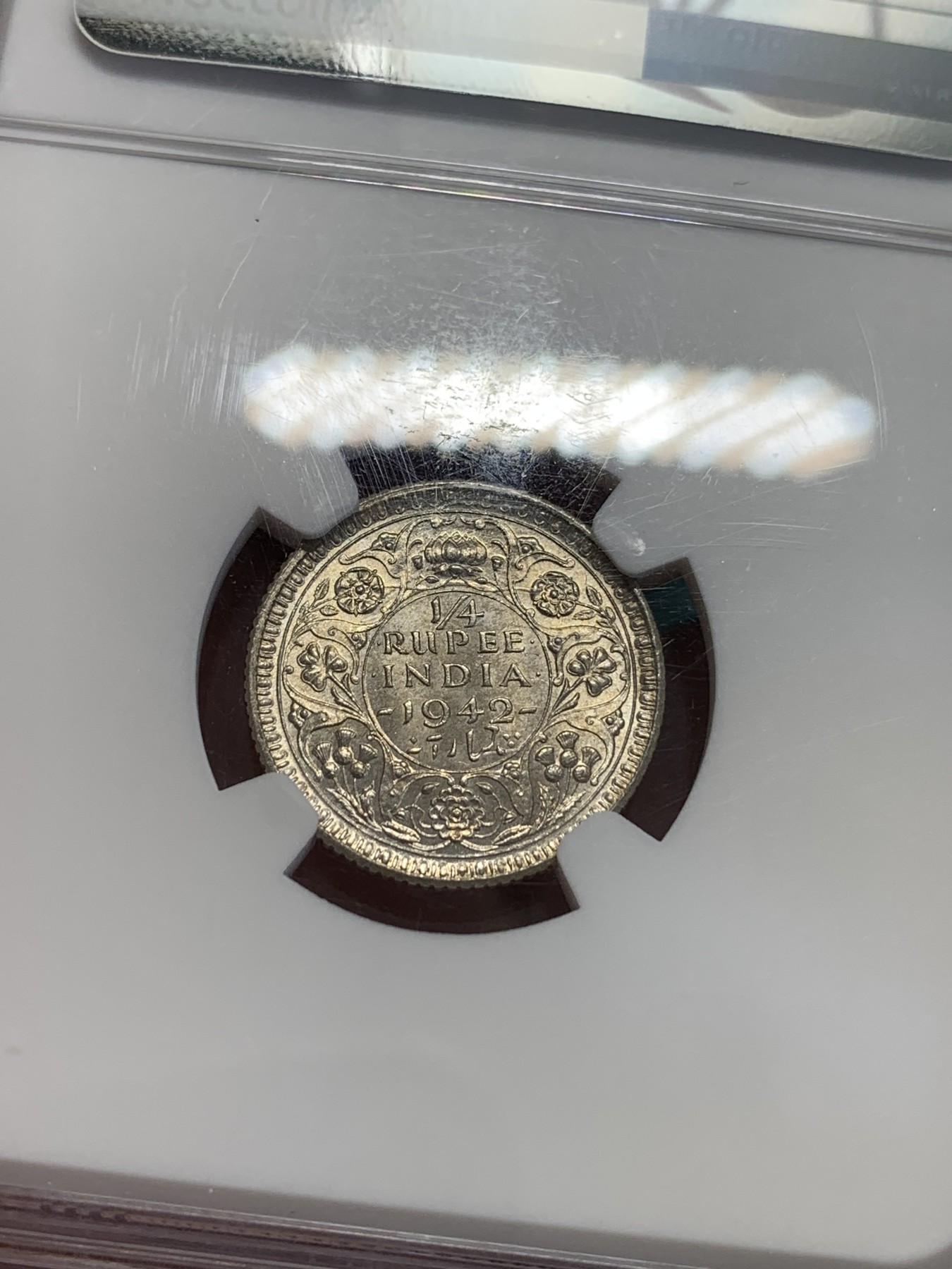 欢迎参加《竞宝斋》为国而庆 老张自藏专场 ，定制纪念章相赠 NGC MS63 英属印度 1942 乔六 1/4卢比银币 大面值常见 1/4的 流通大好品不容易