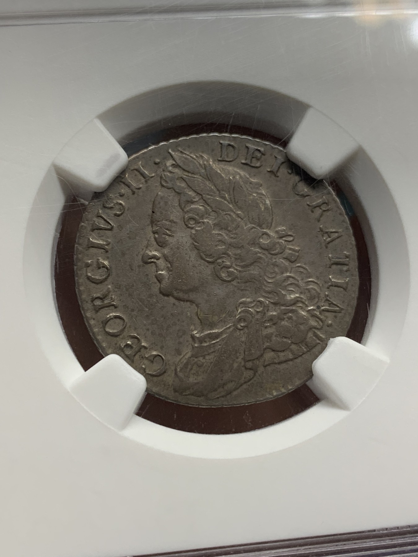 欢迎参加《竞宝斋》为国而庆 老张自藏专场 ，定制纪念章相赠 NGC AU50 英国 1758年 乔二 水泡眼 1先令 银币 原味深包浆 细节好