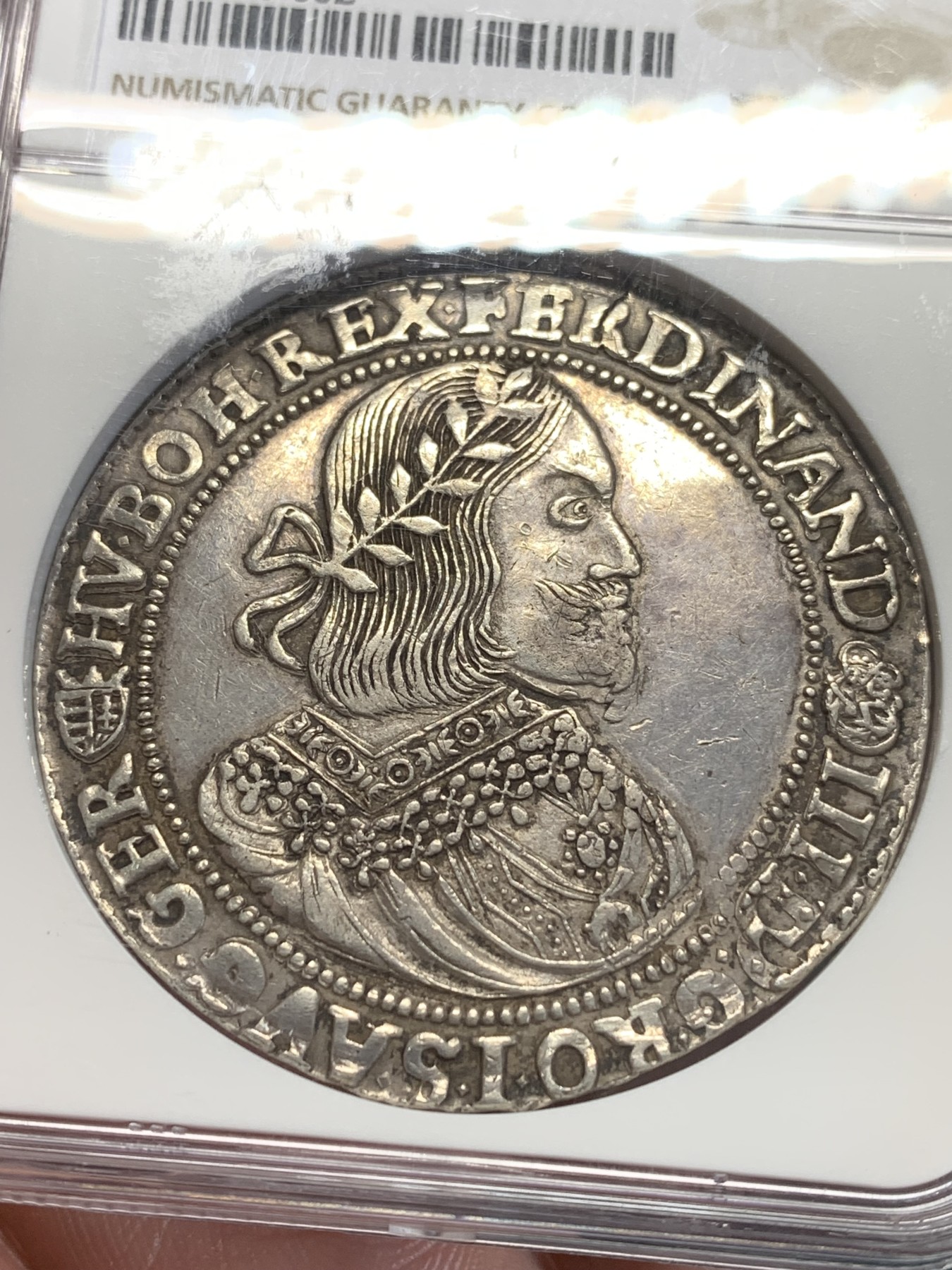 欢迎参加《竞宝斋》为国而庆 老张自藏专场 ，定制纪念章相赠 NGC AUD 匈牙利 1658年 费迪南德三世 泰勒 大银币 这款被仿制的太多了，原铸可以说是少之又少 正反全深打 可藏