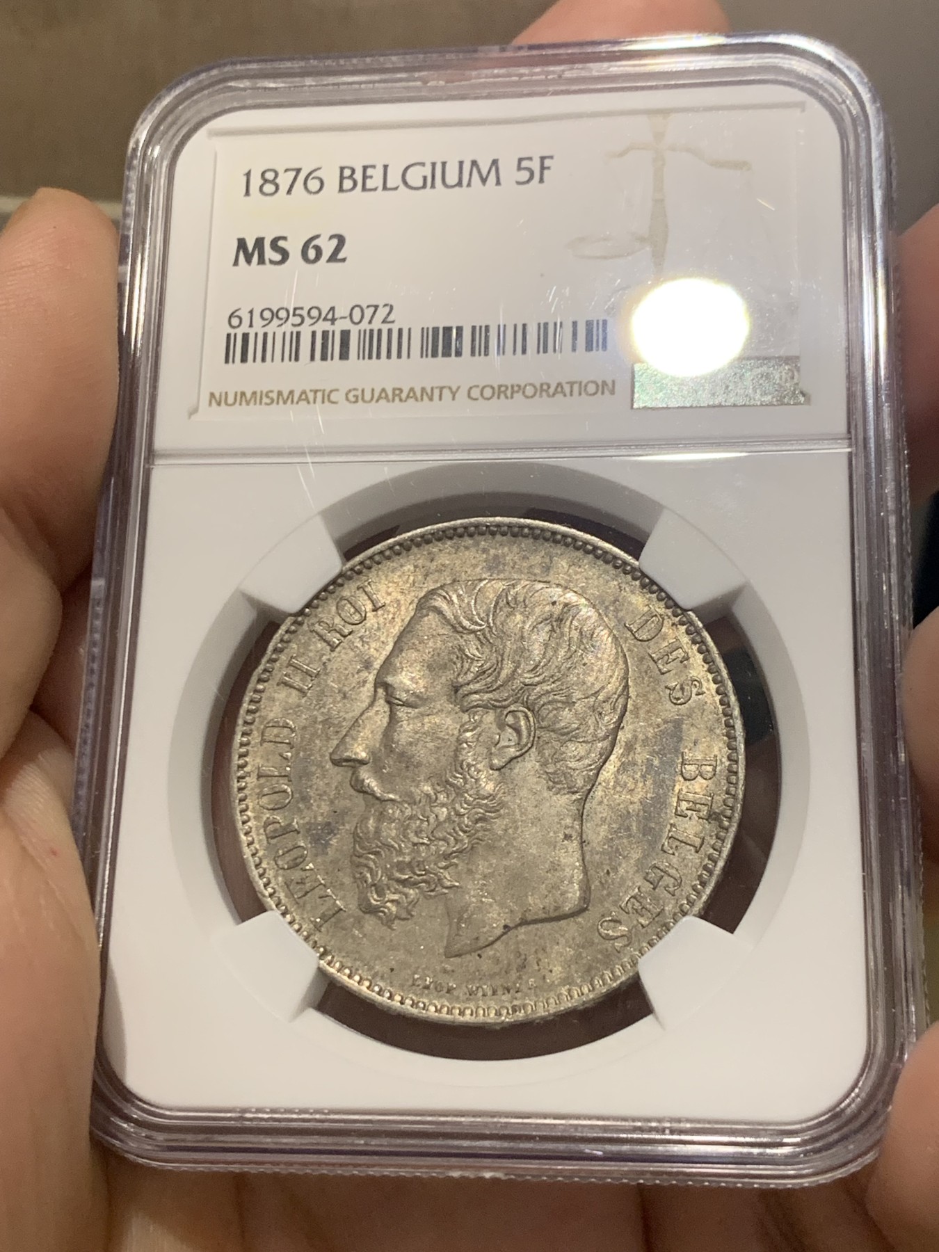 欢迎参加《竞宝斋》为国而庆 老张自藏专场 ，定制纪念章相赠 NGC MS62 比利时 1876年 5法郎银币 不多的年份 原味包浆 难得