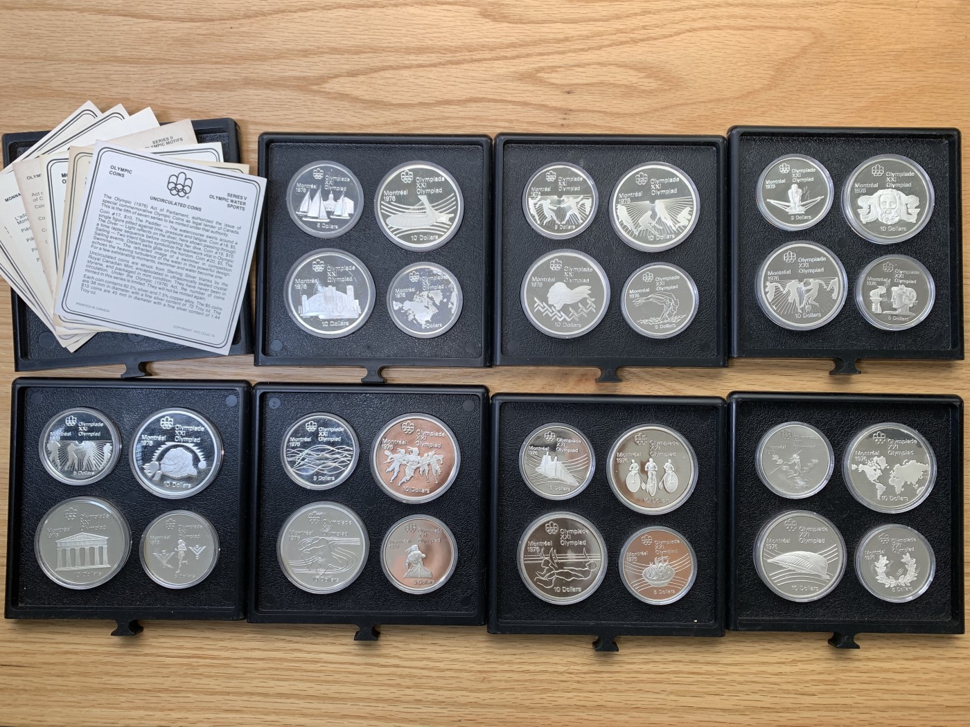 欢迎参加《竞宝斋》为国而庆 老张自藏专场 ，定制纪念章相赠 加拿大 1976年 蒙特利尔奥运会 精制版28枚大全套带原盒证书 24.3克14枚，48.6克14枚1.02公斤 带抽屉木盒 所见唯一
