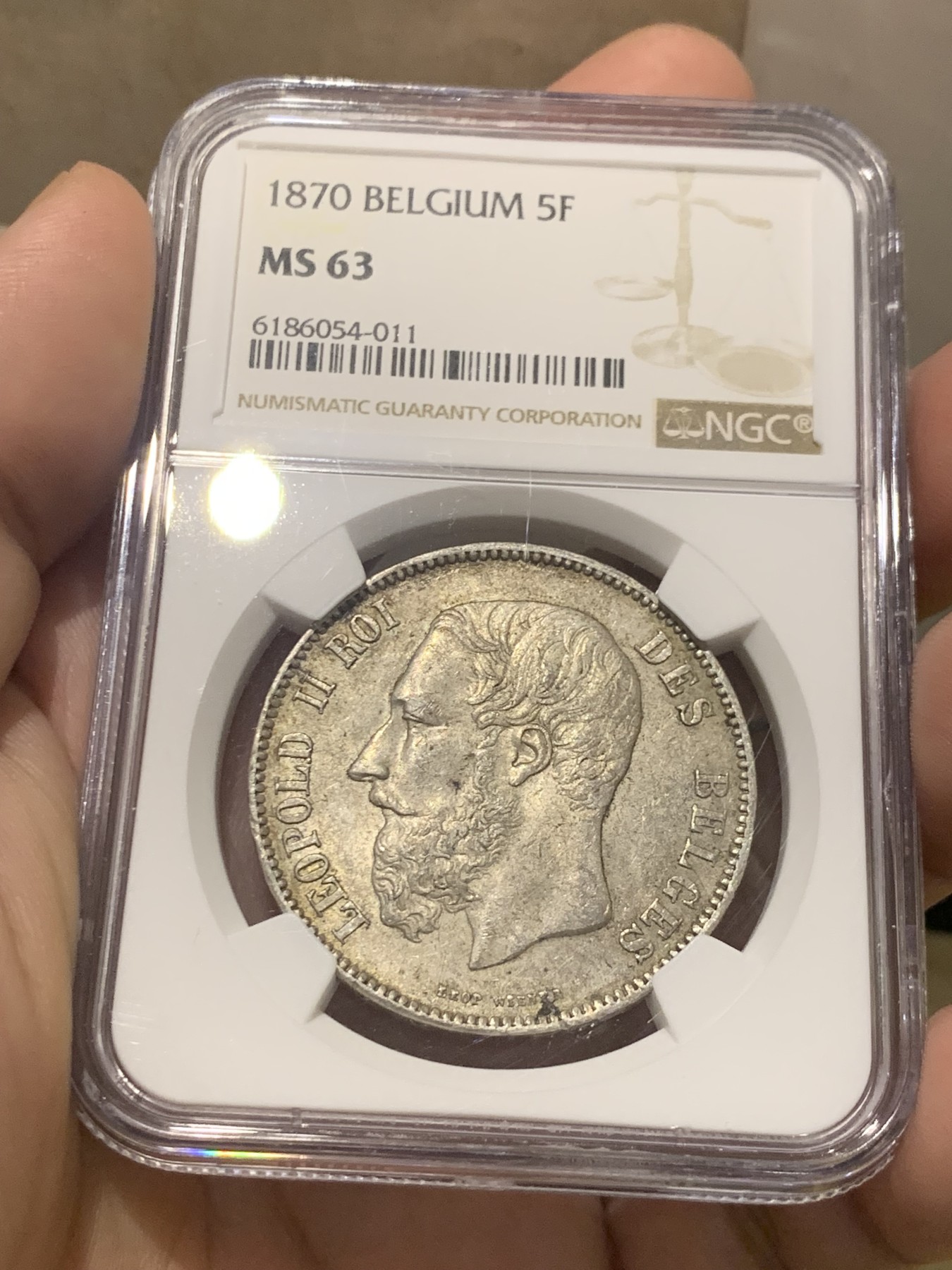 欢迎参加《竞宝斋》为国而庆 老张自藏专场 ，定制纪念章相赠 NGC MS63 比利时 1870年 5法郎银币 不是常见的1873年，63分已经很难遇到了