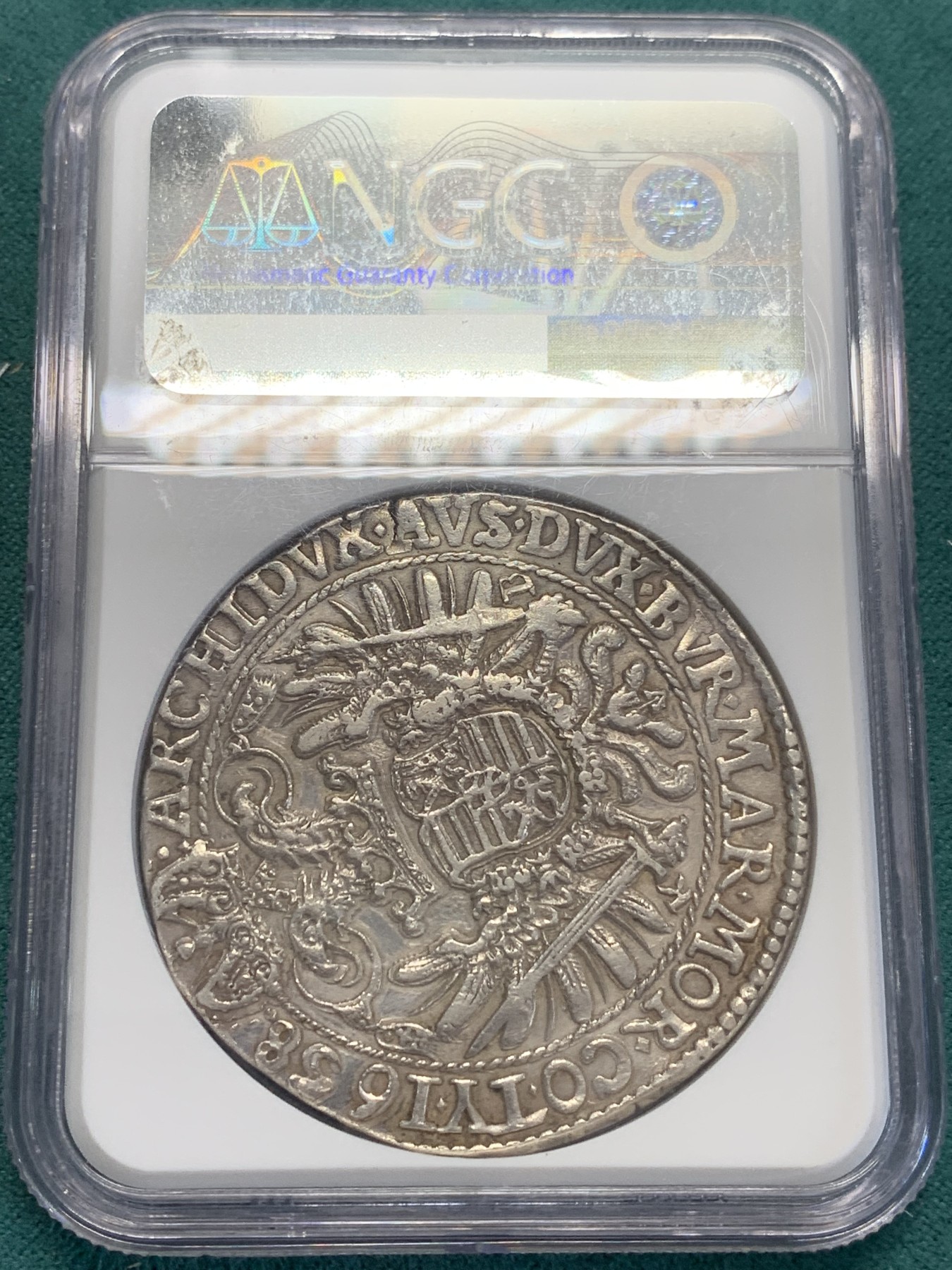 欢迎参加《竞宝斋》为国而庆 老张自藏专场 ，定制纪念章相赠 NGC AUD 匈牙利 1658年 费迪南德三世 泰勒 大银币 这款被仿制的太多了，原铸可以说是少之又少 正反全深打 可藏