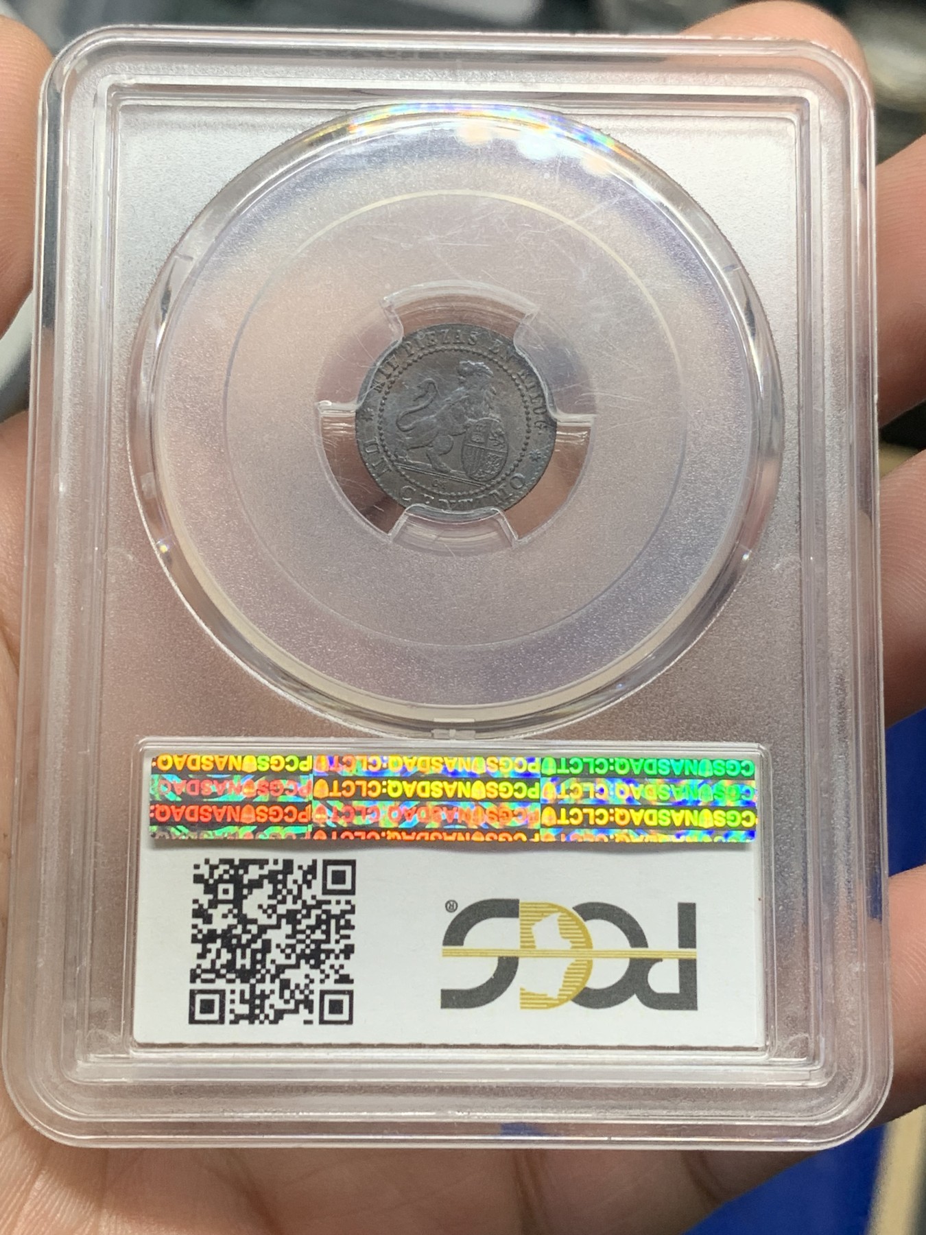 欢迎参加《竞宝斋》为国而庆 老张自藏专场 ，定制纪念章相赠 PCGS MS64BN 西班牙 1870年 坐人 狮子 1C 铜币 细节慢慢 状态极好