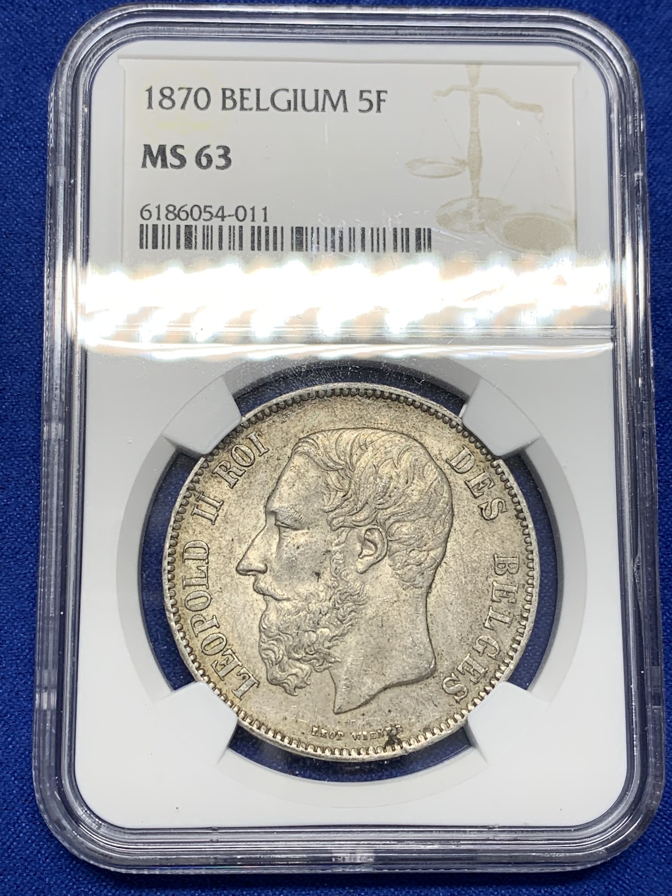 欢迎参加《竞宝斋》为国而庆 老张自藏专场 ，定制纪念章相赠 NGC MS63 比利时 1870年 5法郎银币 不是常见的1873年，63分已经很难遇到了