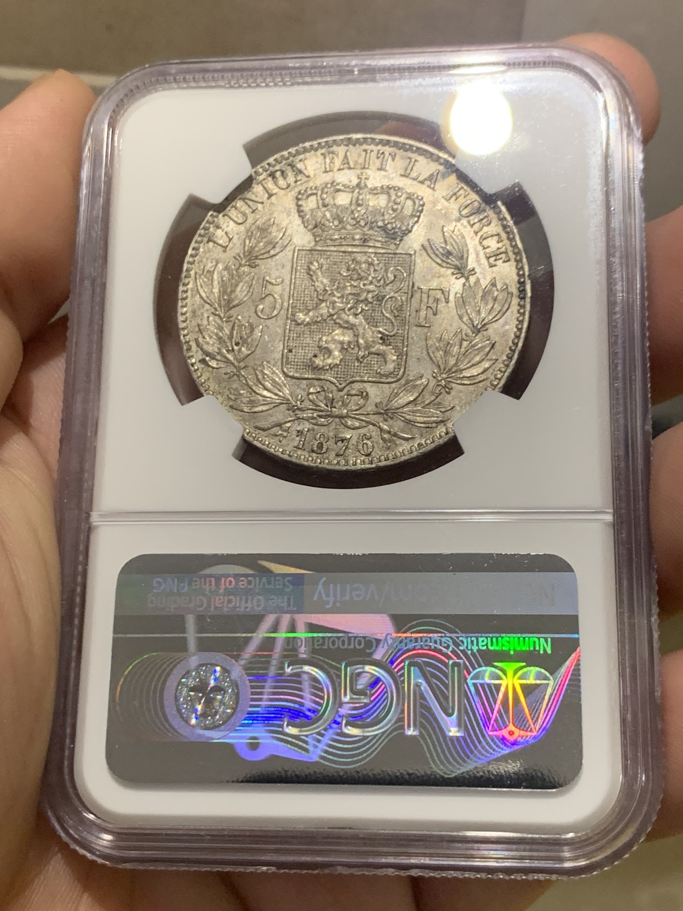 欢迎参加《竞宝斋》为国而庆 老张自藏专场 ，定制纪念章相赠 NGC MS62 比利时 1876年 5法郎银币 不多的年份 原味包浆 难得