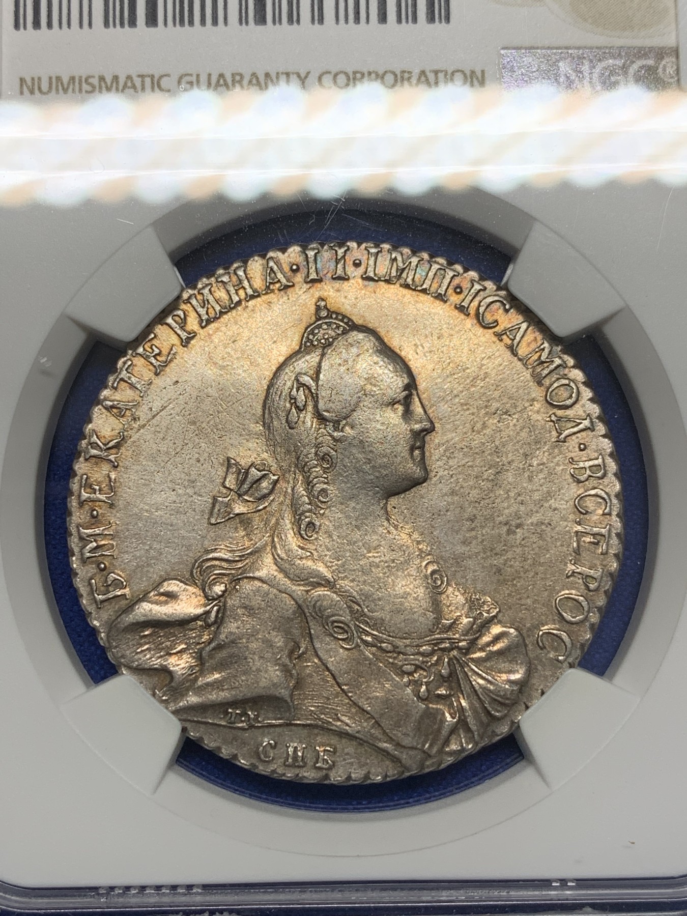 欢迎参加《竞宝斋》为国而庆 老张自藏专场 ，定制纪念章相赠 NGC AU 沙俄 叶卡捷琳娜二世 1769 1卢布银币 双面淡金包浆 底板光好 全深打 币胚完整 除了没给分 不输其它