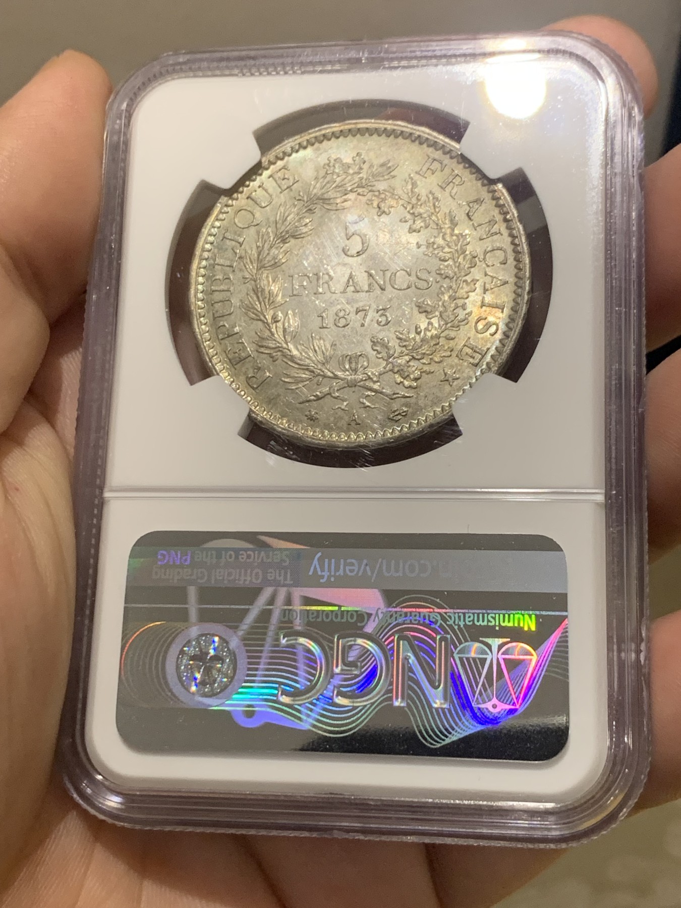 欢迎参加《竞宝斋》为国而庆 老张自藏专场 ，定制纪念章相赠 NGC MS62 法国 1873年 大力神5法郎银币 转光一流 62分中的战斗机