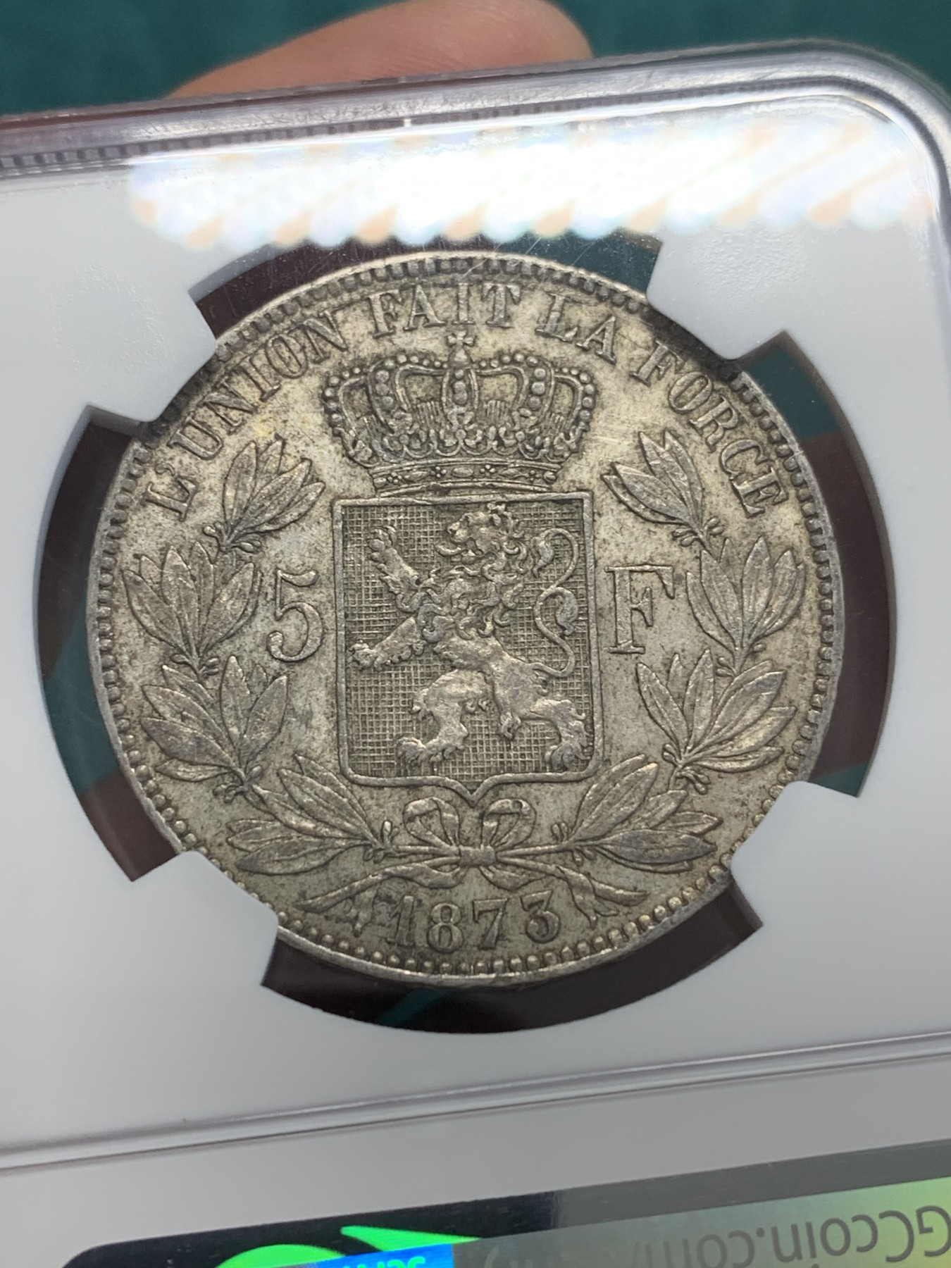 欢迎参加《竞宝斋》为国而庆 老张自藏专场 ，定制纪念章相赠 NGC AU 比利时1873年 利奥波德二世 5法郎银币 原味包浆 胡子清晰