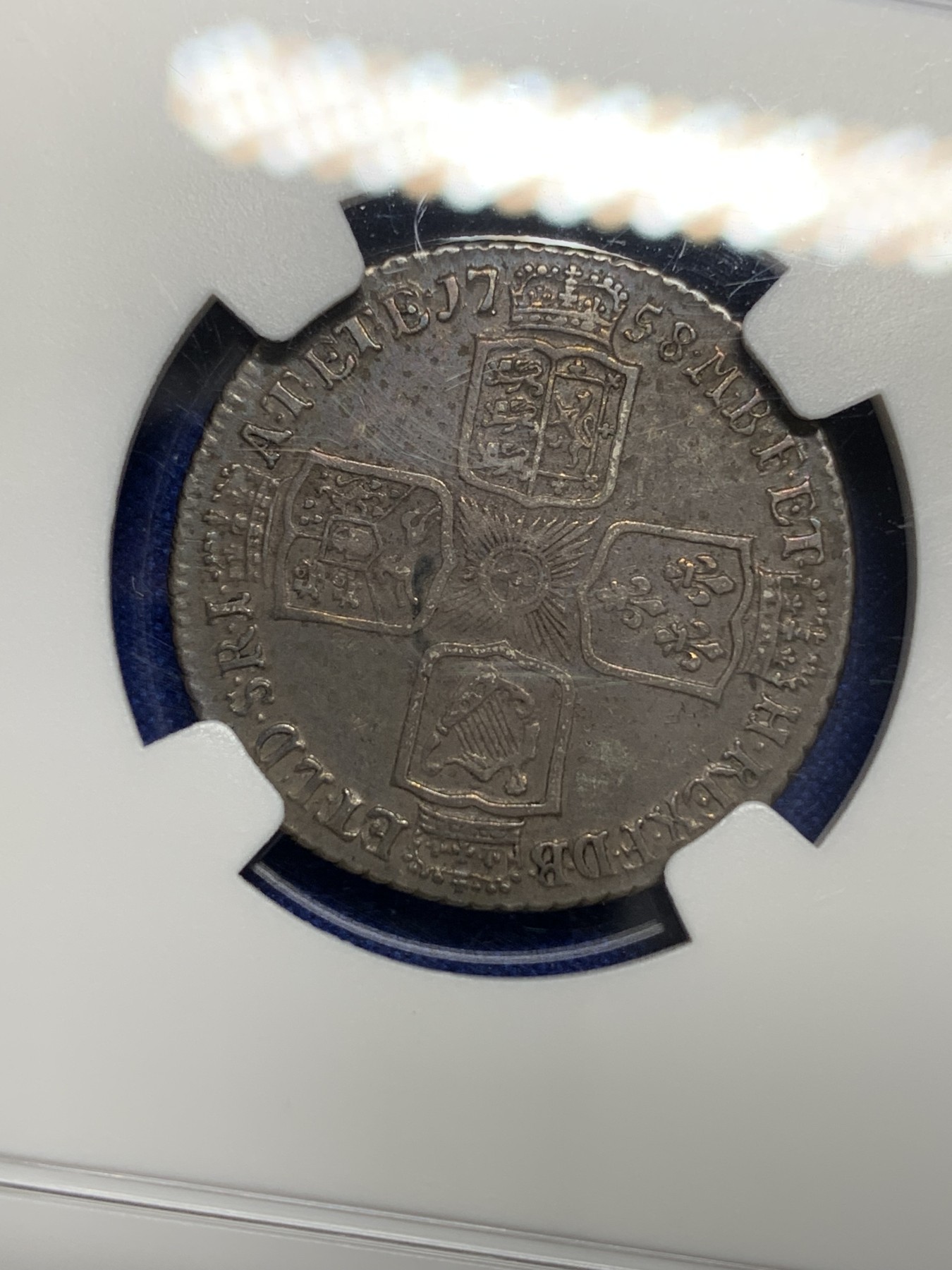 欢迎参加《竞宝斋》为国而庆 老张自藏专场 ，定制纪念章相赠 NGC AU50 英国 1758年 乔二 水泡眼 1先令 银币 原味深包浆 细节好