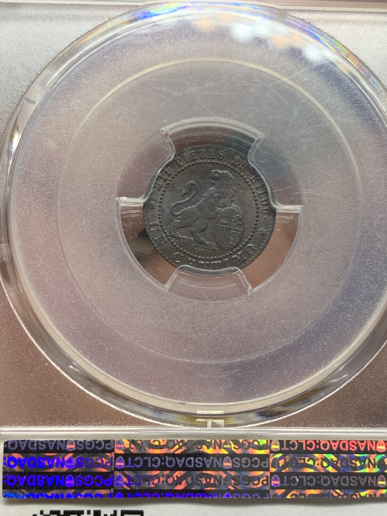 欢迎参加《竞宝斋》为国而庆 老张自藏专场 ，定制纪念章相赠 PCGS MS64BN 西班牙 1870年 坐人 狮子 1C 铜币 细节慢慢 状态极好