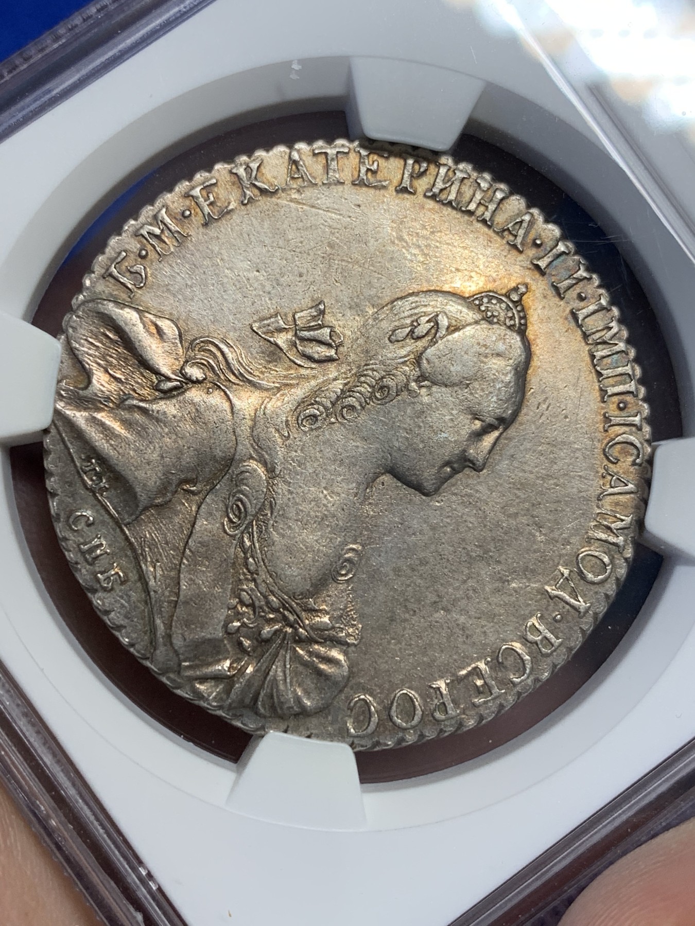 欢迎参加《竞宝斋》为国而庆 老张自藏专场 ，定制纪念章相赠 NGC AU 沙俄 叶卡捷琳娜二世 1769 1卢布银币 双面淡金包浆 底板光好 全深打 币胚完整 除了没给分 不输其它