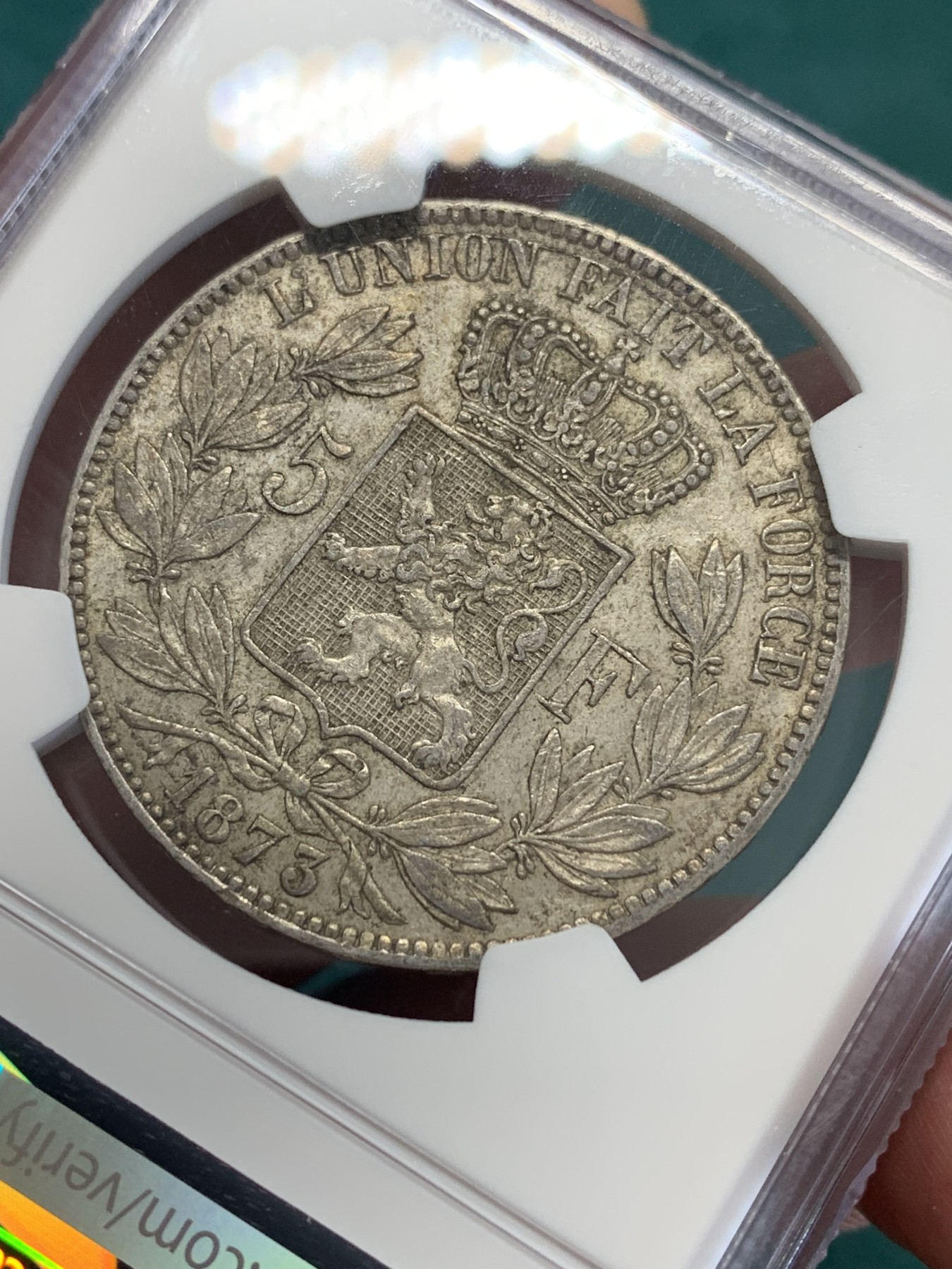 欢迎参加《竞宝斋》为国而庆 老张自藏专场 ，定制纪念章相赠 NGC AU 比利时1873年 利奥波德二世 5法郎银币 原味包浆 胡子清晰