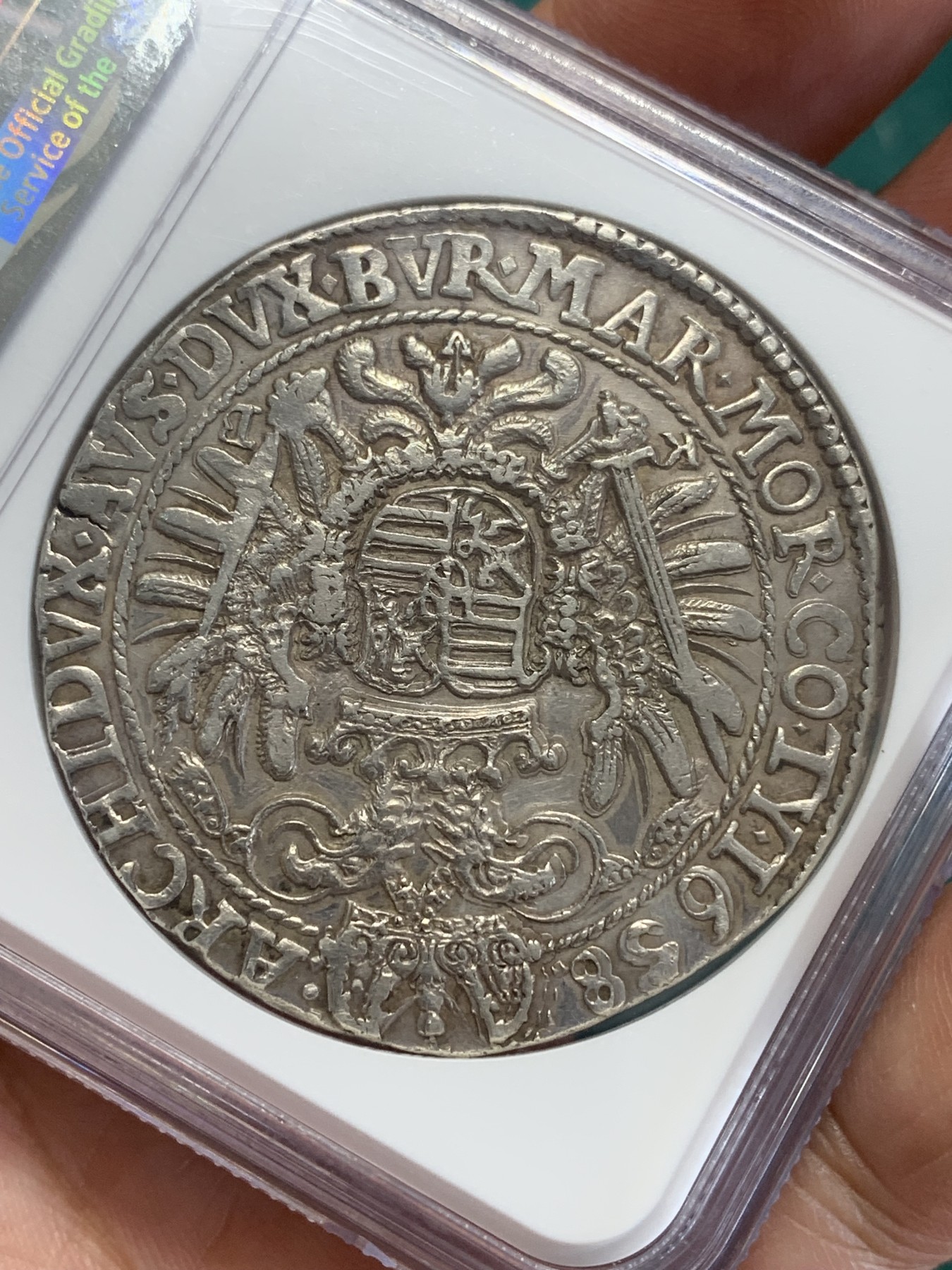 欢迎参加《竞宝斋》为国而庆 老张自藏专场 ，定制纪念章相赠 NGC AUD 匈牙利 1658年 费迪南德三世 泰勒 大银币 这款被仿制的太多了，原铸可以说是少之又少 正反全深打 可藏