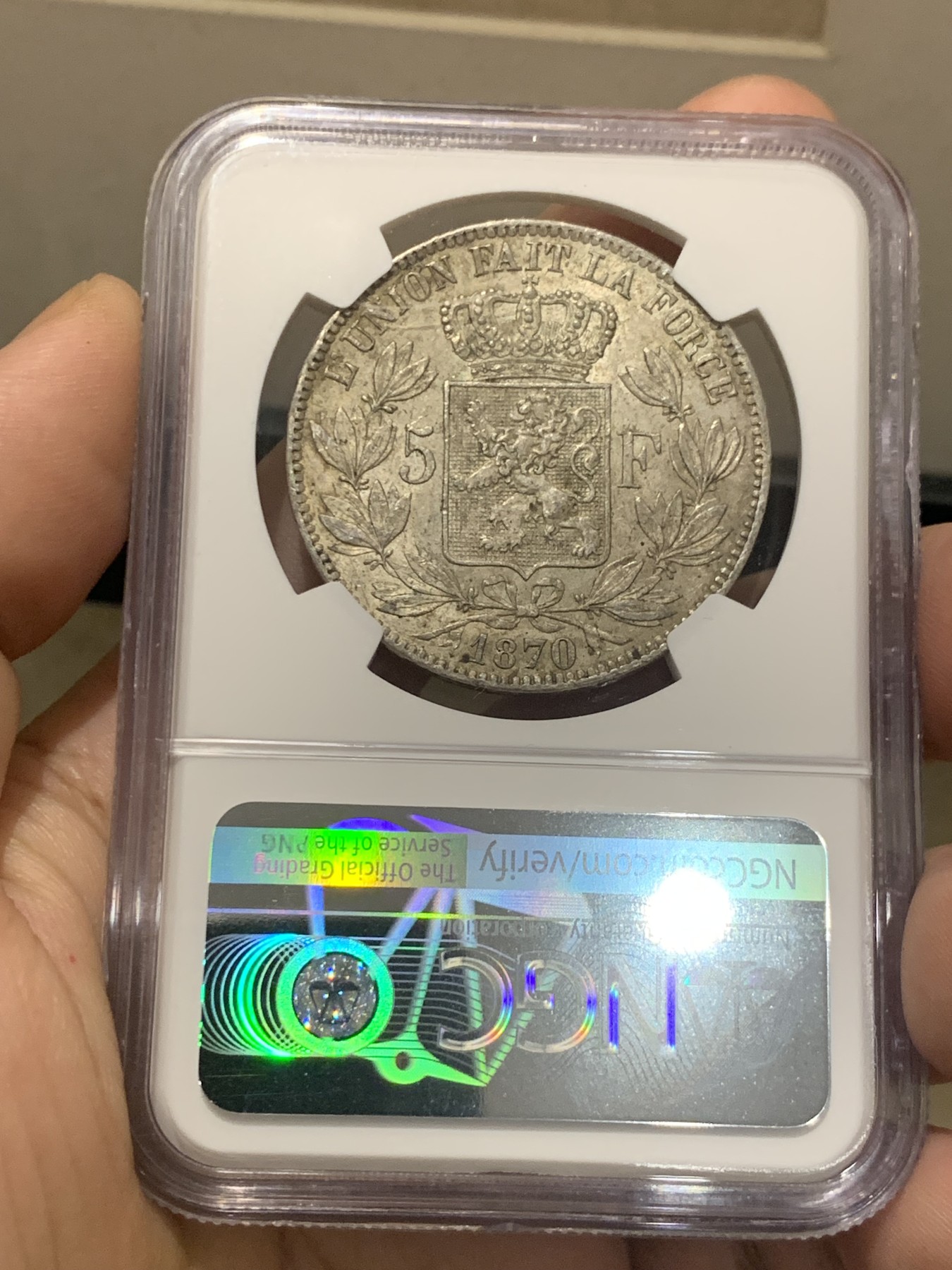 欢迎参加《竞宝斋》为国而庆 老张自藏专场 ，定制纪念章相赠 NGC MS63 比利时 1870年 5法郎银币 不是常见的1873年，63分已经很难遇到了