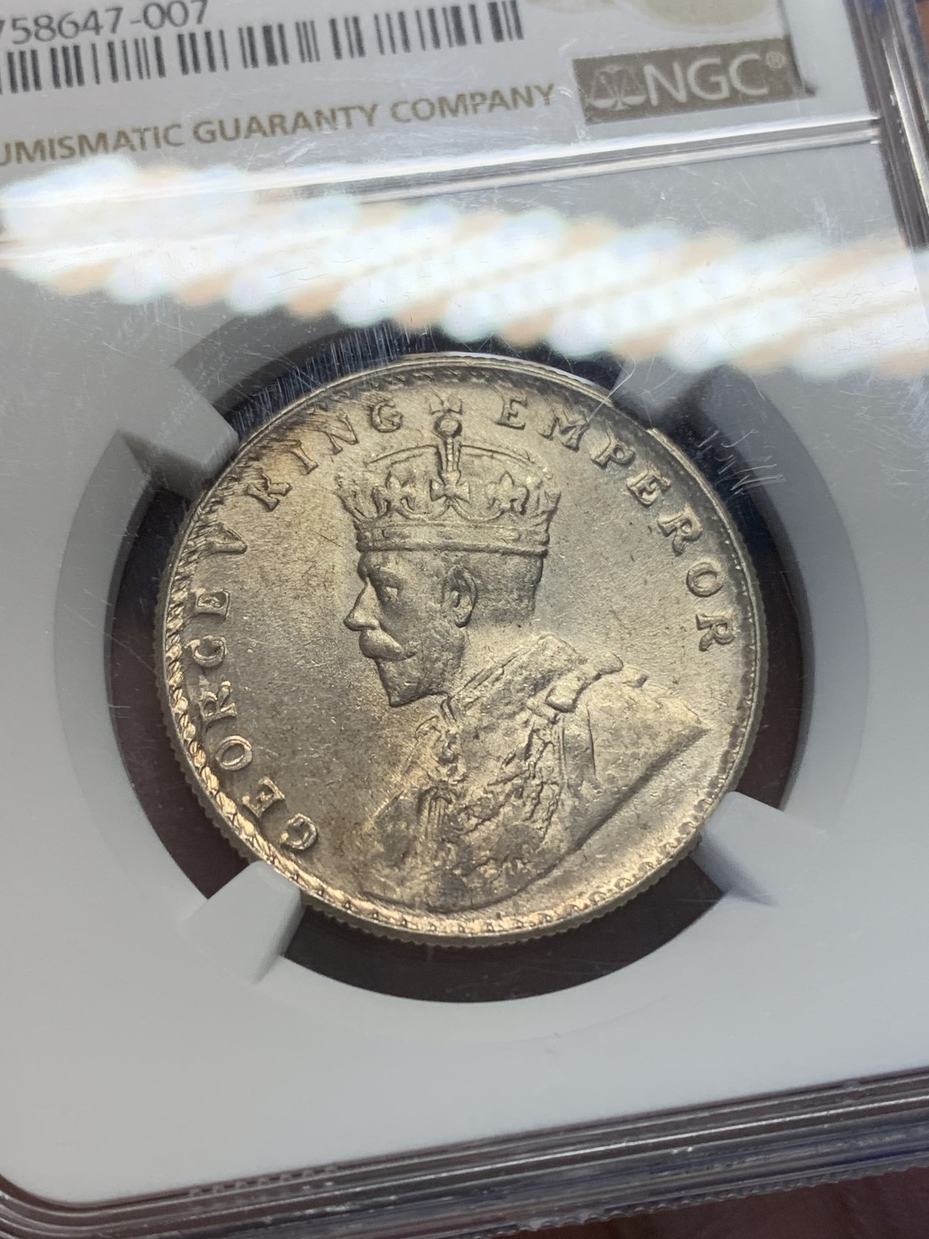 《竞宝斋》第204场-周日，周一 2场 (全场包邮) NGC-MS63 印度 1919（B）乔治五世1卢比银币 底板光亮 63的分数很不错了