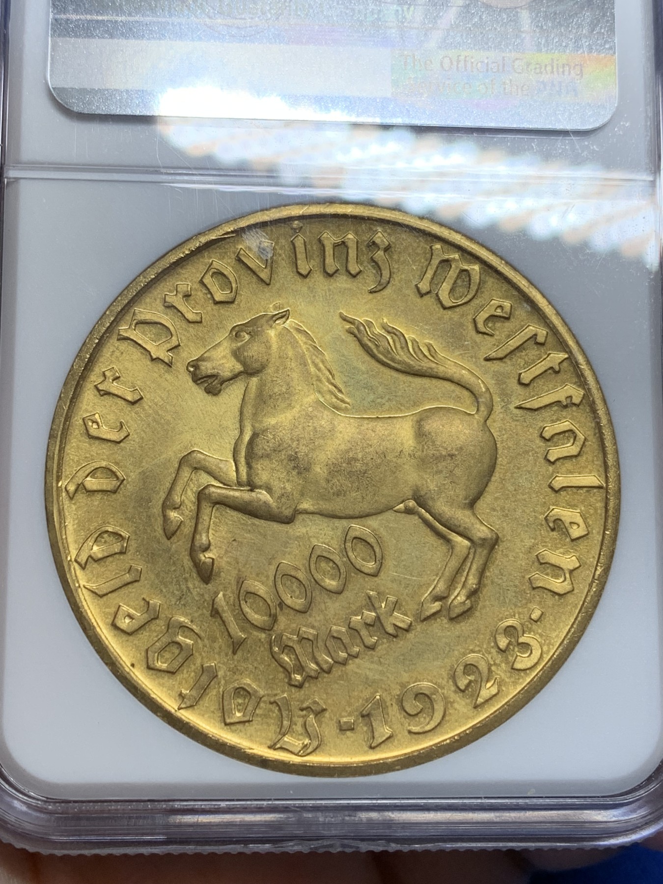 《竞宝斋》第205场-周日，周一 2场 (全场包邮) NGC MS64 德国1923年威斯特法伦10000马克大马币，高分金光，镀金完整