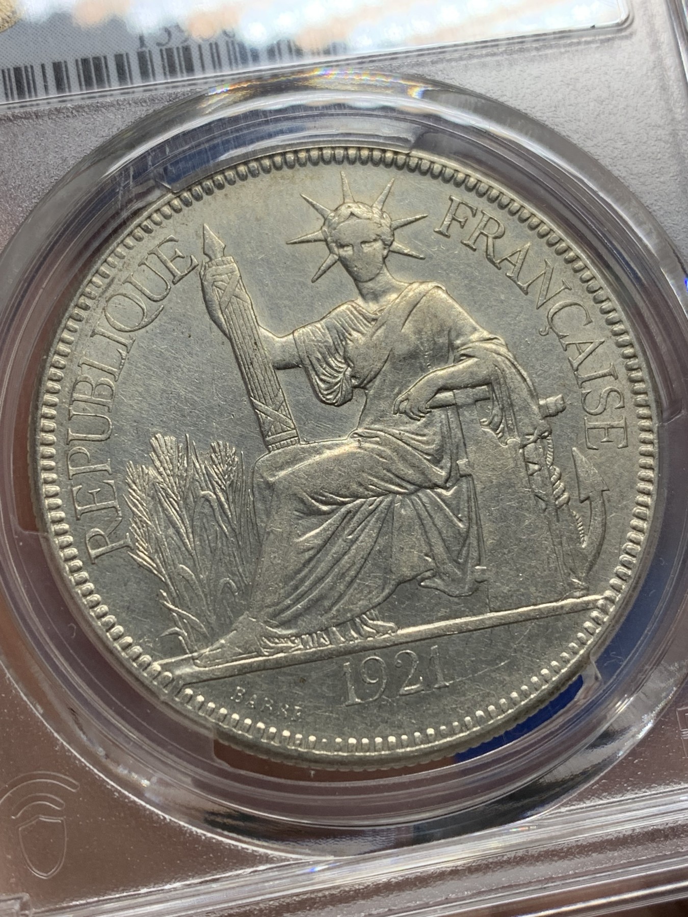 《竞宝斋》第205场-周日，周一 2场 (全场包邮) PCGS-AU 1921年法属印支坐洋银币，无字版，普遍模具弱打的蒙面女神