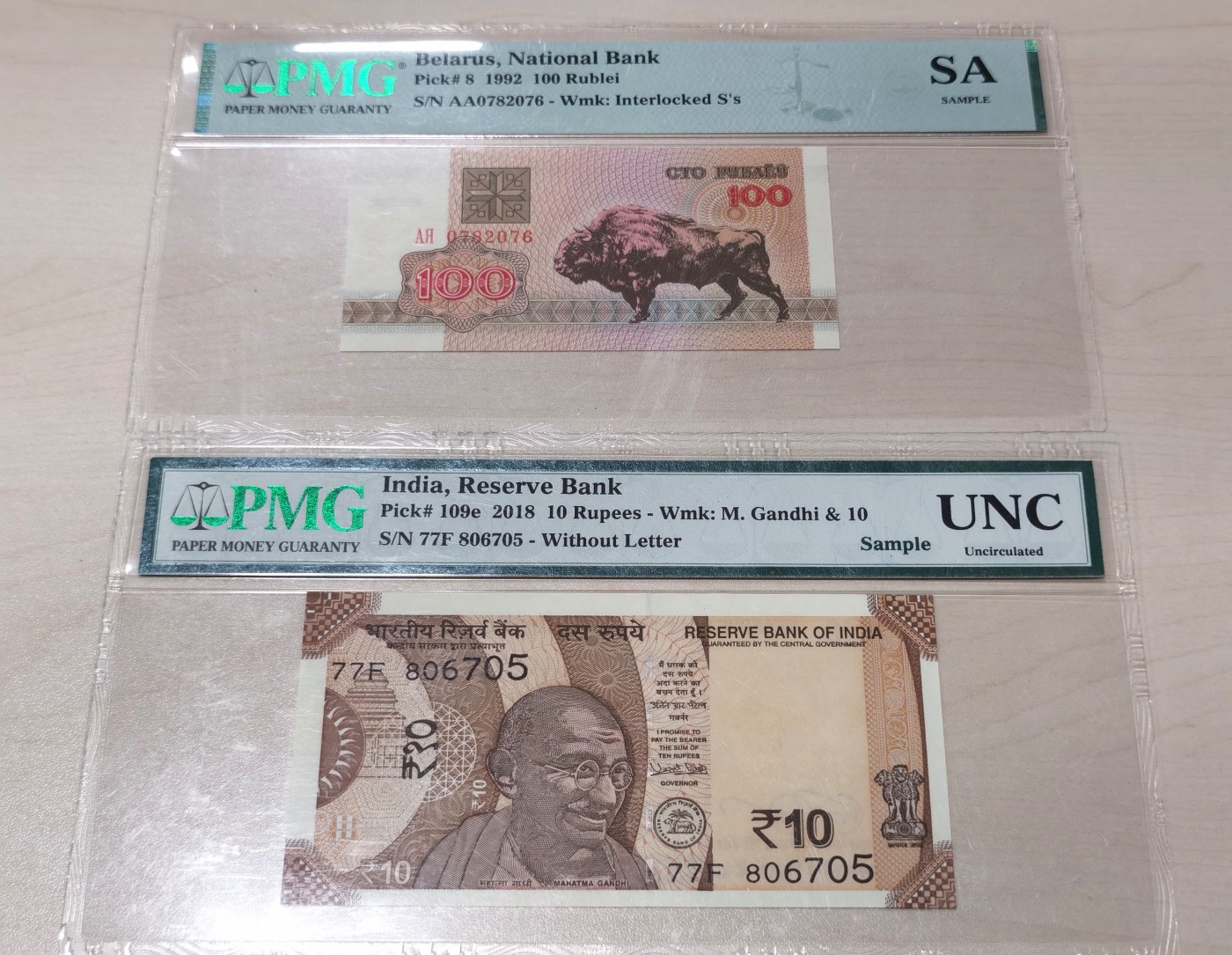 博洋堂世界钱币拍卖第047期（全场包邮） PMG Sample样品评级纸币两张，印度10卢比为伦敦coinex币展2019年封装纪念，白俄罗斯1992年100卢布