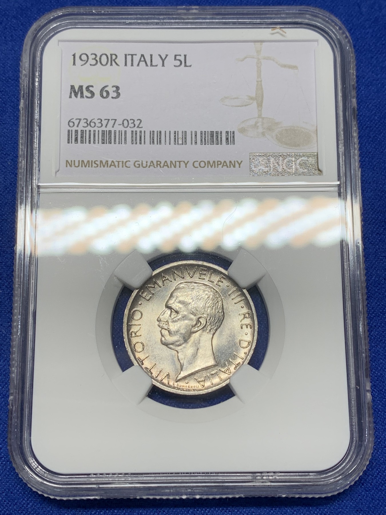 《竞宝斋》第205场-周日，周一 2场 (全场包邮) NGC MS63 意大利1930年5里拉立鹰银币 光度、压印细节都很好 铸纹清洗、币边锐利 被压分太狠了