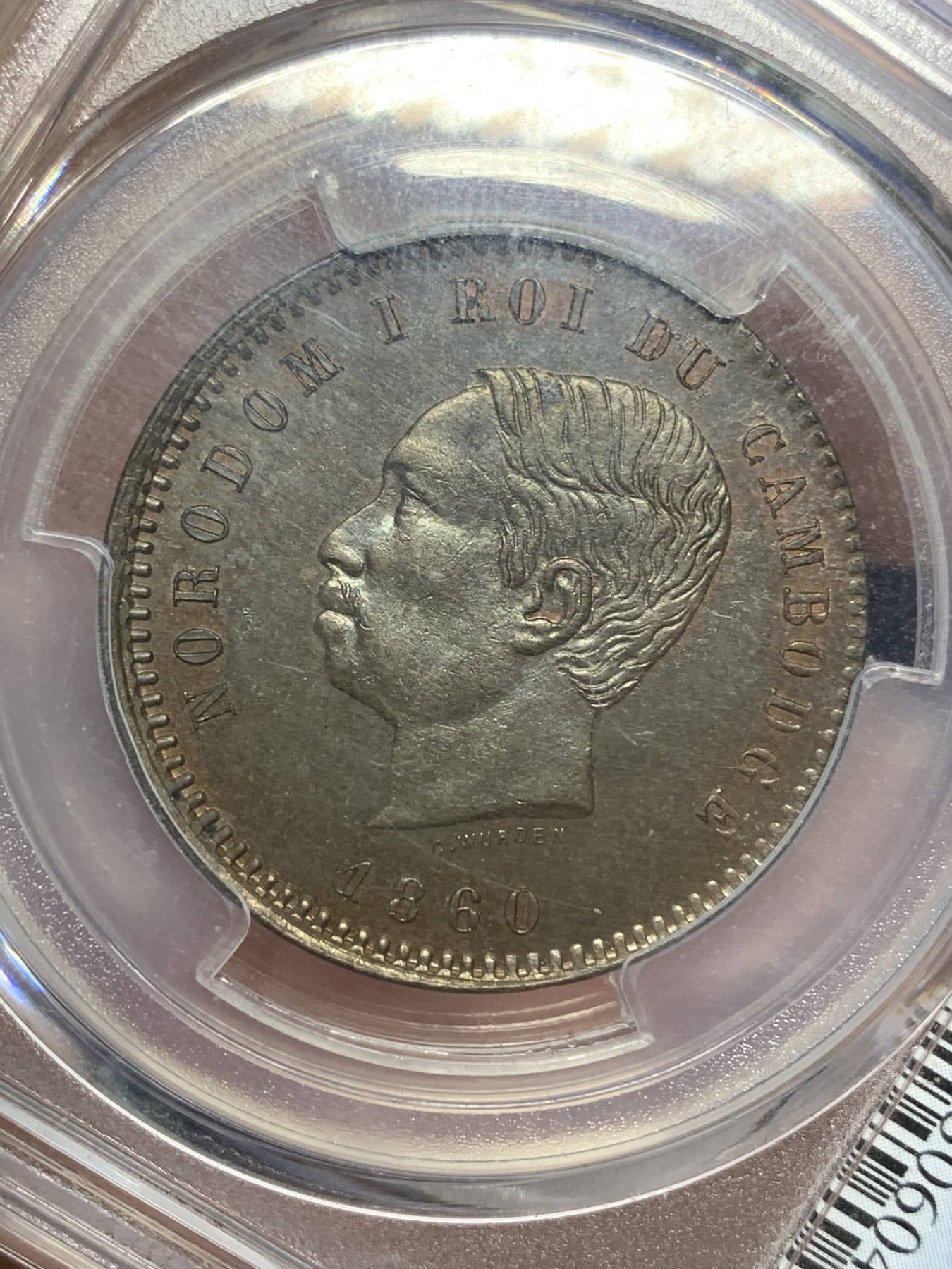 《竞宝斋》第205场-周日，周一 2场 (全场包邮) PCGS-MS64BN 法属柬埔寨 诺罗敦10分铜币 官网广告币第三张 上面两个65的 柬埔寨热门品种