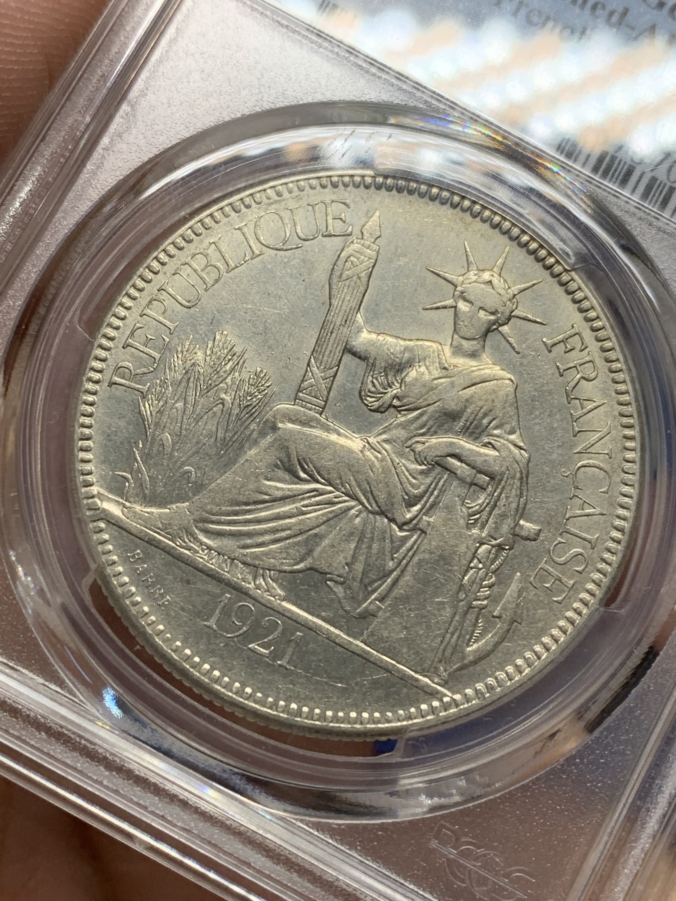 《竞宝斋》第205场-周日，周一 2场 (全场包邮) PCGS-AU 1921年法属印支坐洋银币，无字版，普遍模具弱打的蒙面女神