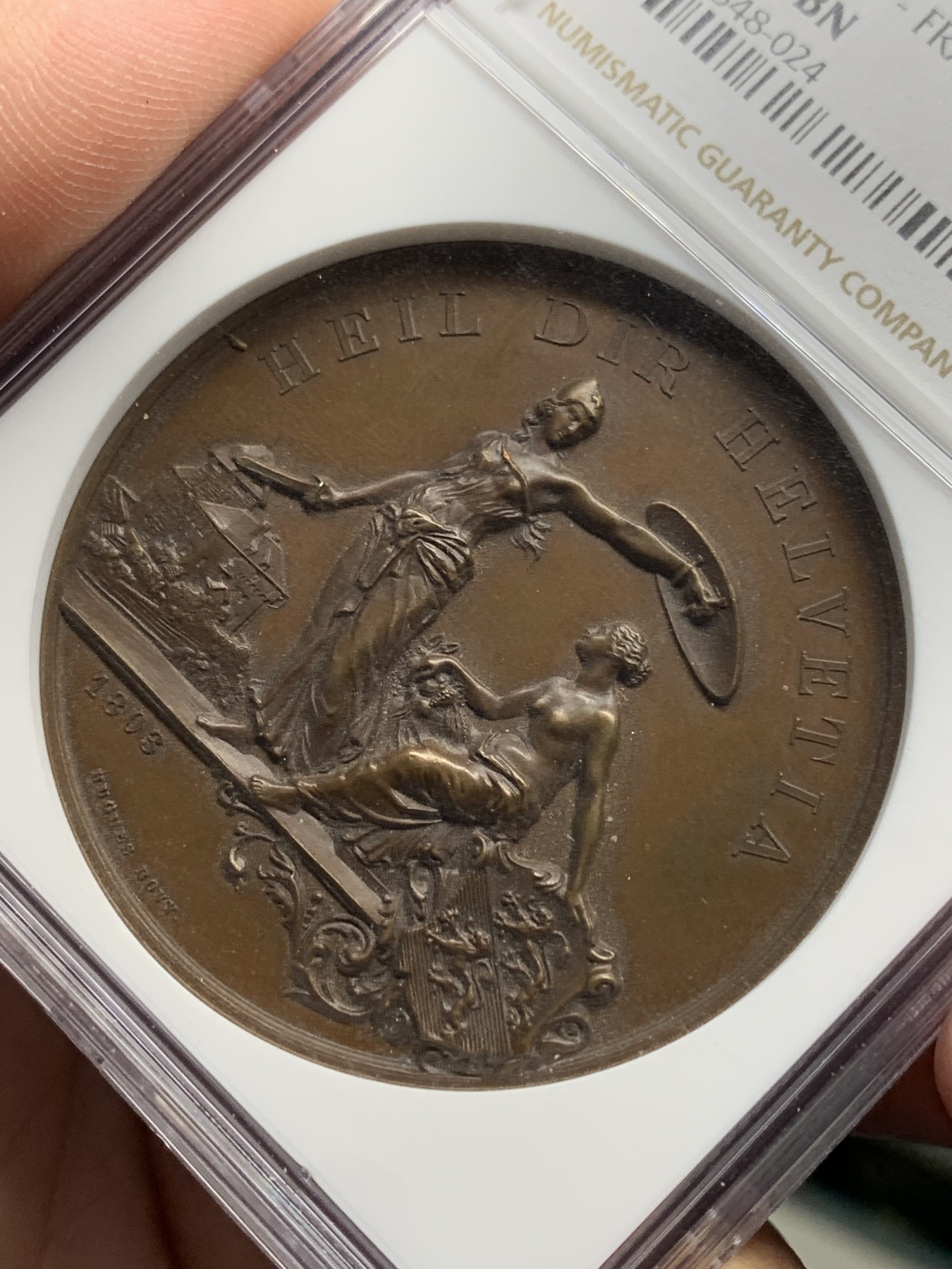 《竞宝斋》第205场-周日，周一 2场 (全场包邮) NGC MS63 1890年瑞士弗劳恩菲尔德射击节 美女与野兽高浮雕铜章 热门经典 细节极好 加厚盒子