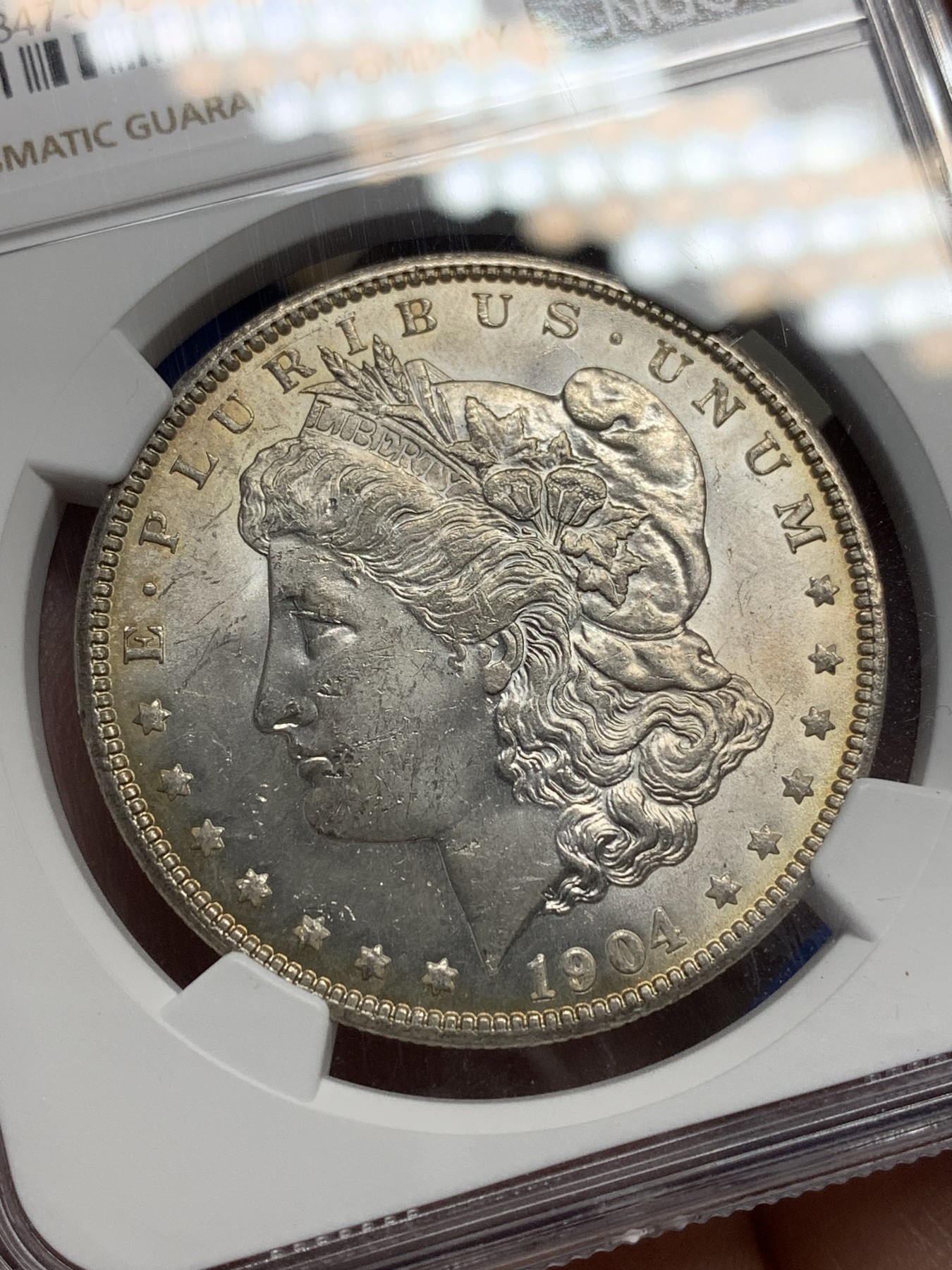 《竞宝斋》第205场-周日，周一 2场 (全场包邮) NGC MS62 美国1904年摩根1美元银币 光度好 感觉低评了