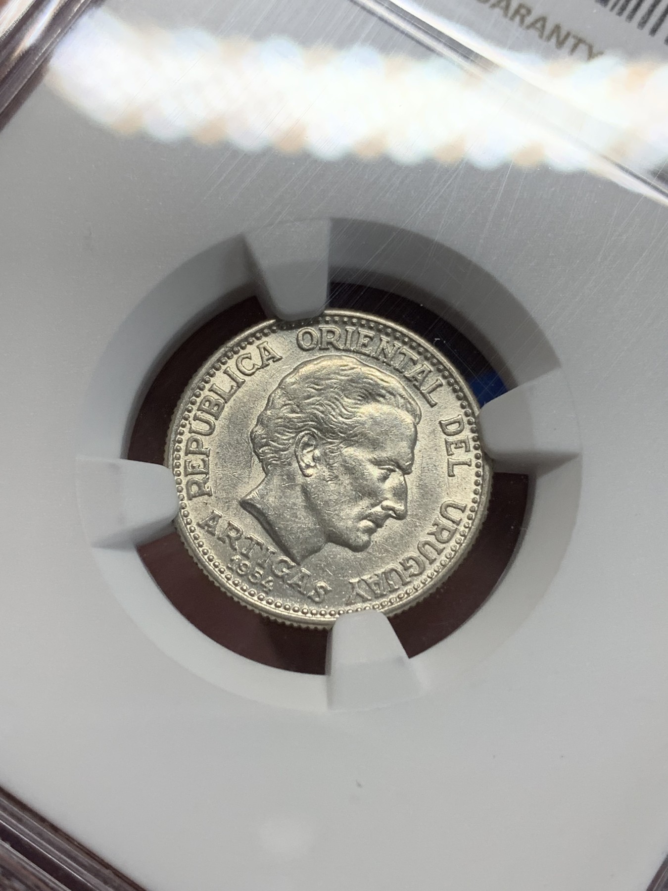 《竞宝斋》第205场-周日，周一 2场 (全场包邮) NGC MS62 乌拉圭1954年20分银币