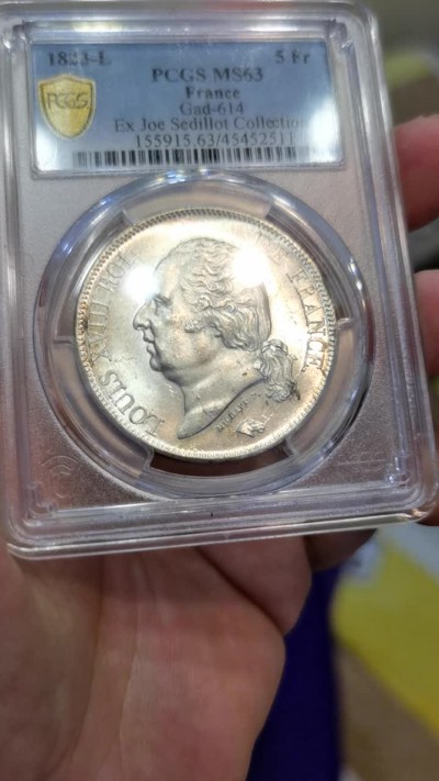 博洋堂世界钱币拍卖第047期（全场包邮） PCGS MS63 法国1823L路易十八5法朗银币,底板一流，镜面车轮光状态，版别郁金香巴约纳厂，稀少。名家旧藏（Joe.sedillot），官方封面广告币