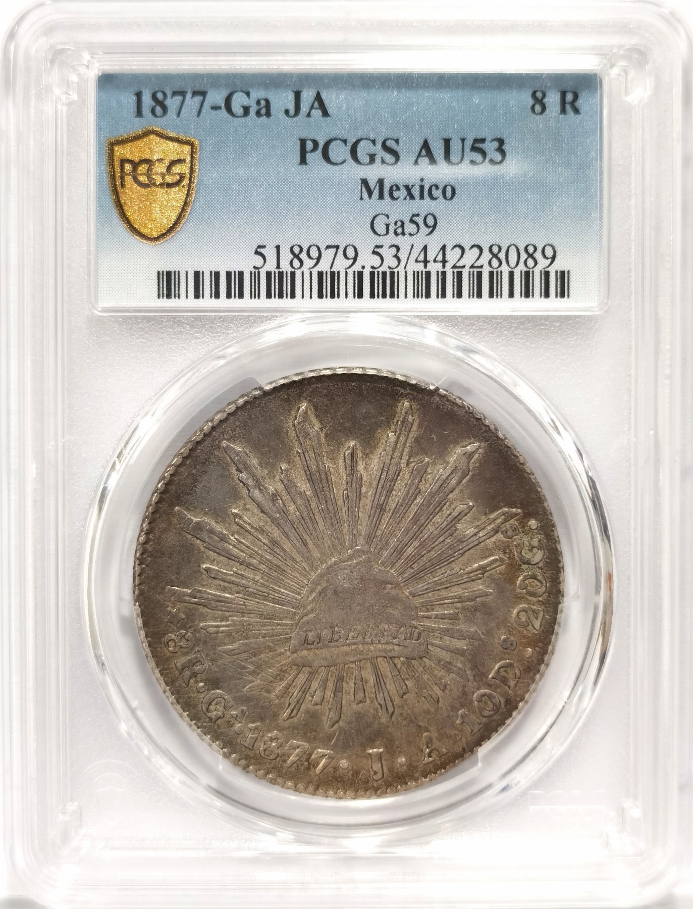 博洋堂世界钱币拍卖第047期（全场包邮） PCGS AU53 墨西哥1877年Ga JA鹰洋 官网封面币 中期中羽毛算好的了 通体灰绿包浆，浑然天成，实在难得！个人觉得正面是58状态