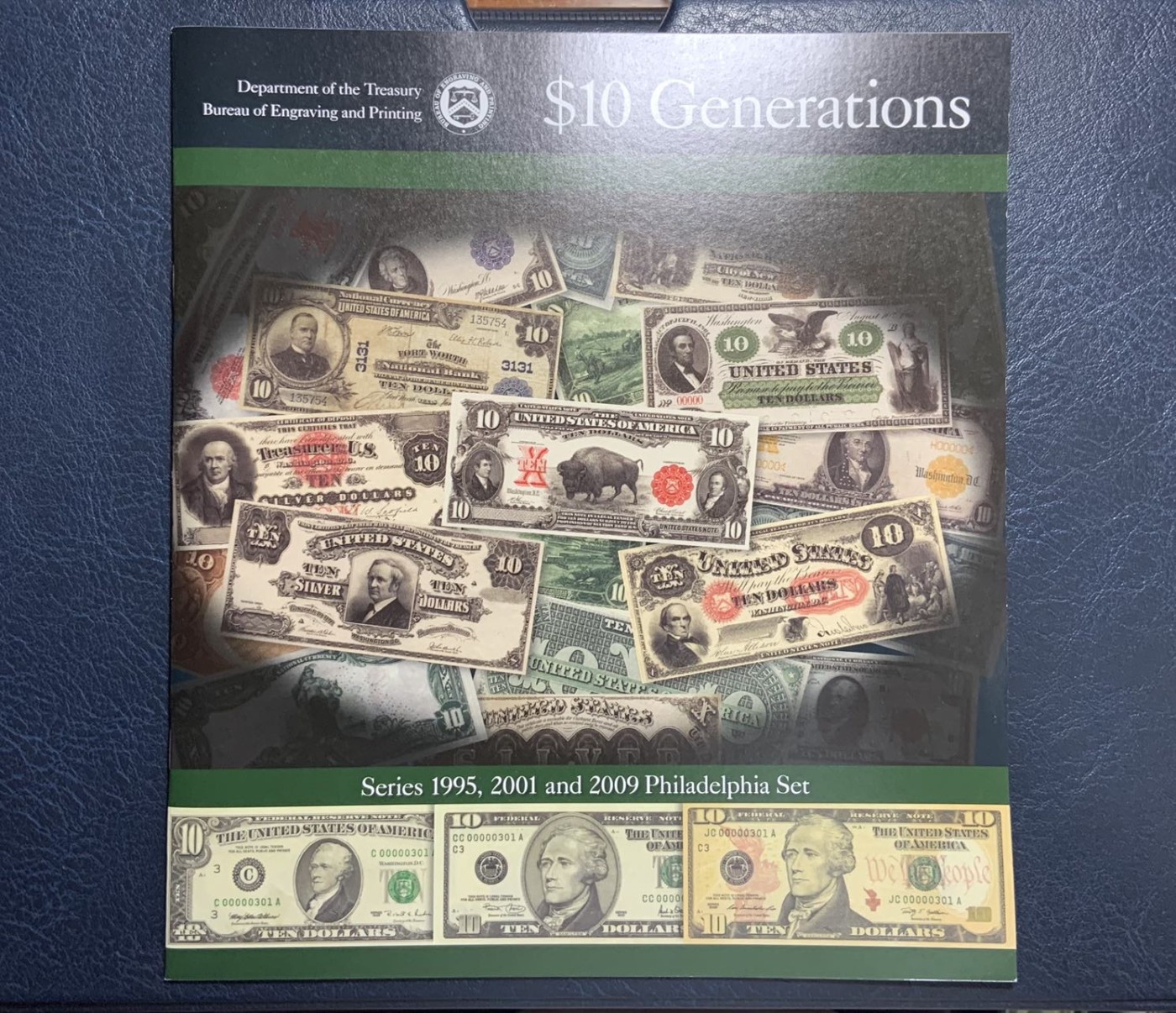收藏联盟Quantum Auction 第296期拍卖  美国3个版本10美元全同千位号纪念册 品相全新UNC 号码无4  包装纸盒有点旧 