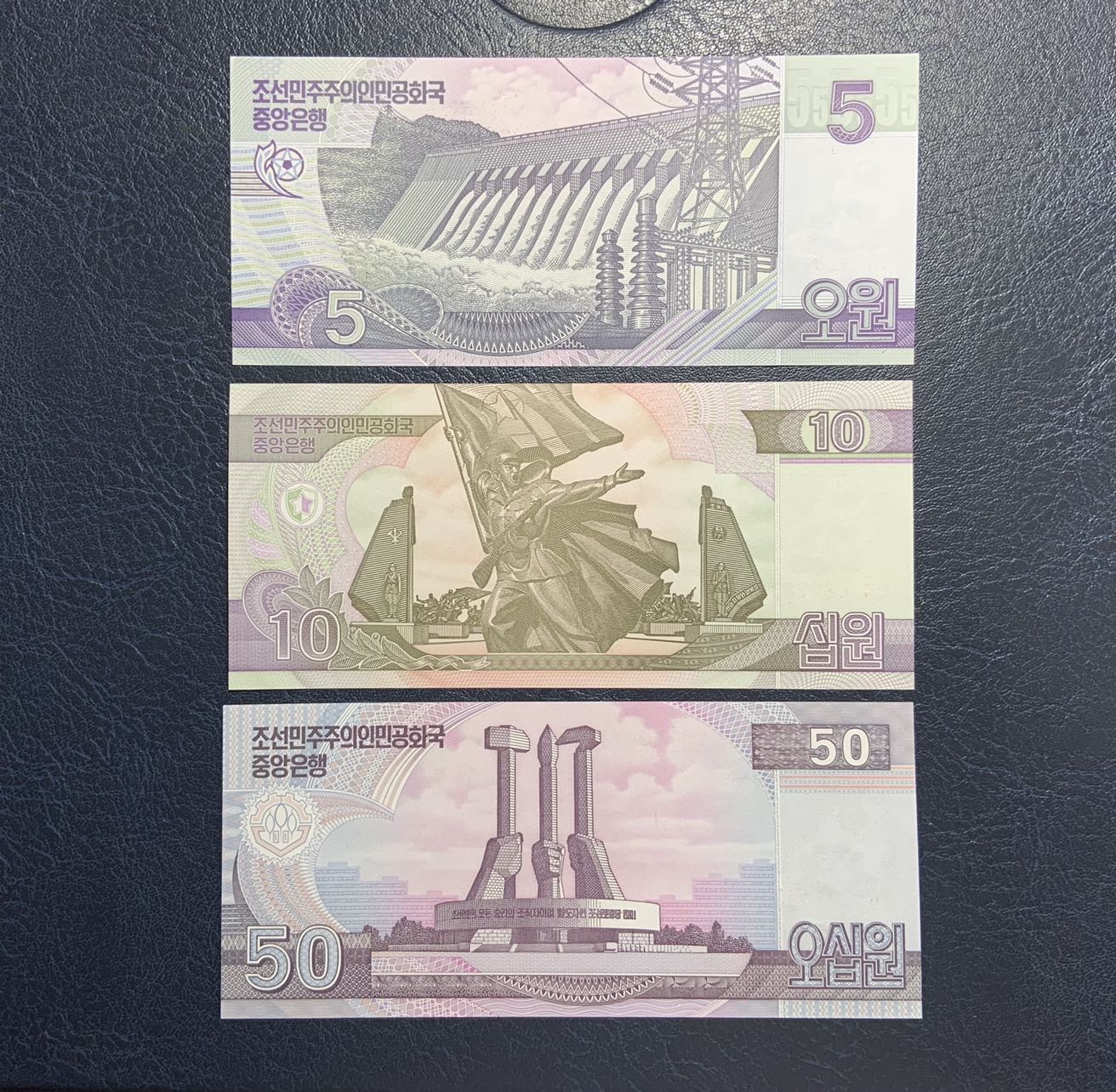 收藏联盟Quantum Auction 第296期拍卖  朝鲜2002年5-50元和2008年100-5000元尾二同一套 品相全新UNC(500有瑕疵，细节如图) 少见无加盖版 
