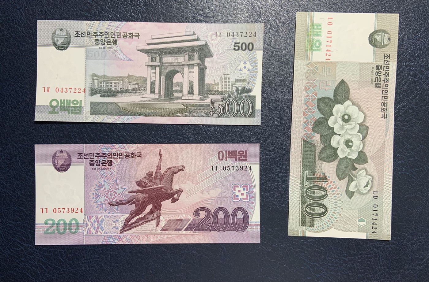 收藏联盟Quantum Auction 第296期拍卖  朝鲜2002年5-50元和2008年100-5000元尾二同一套 品相全新UNC(500有瑕疵，细节如图) 少见无加盖版 