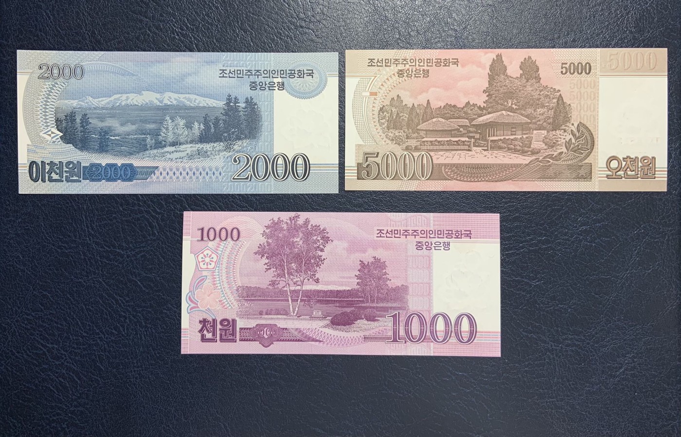 收藏联盟Quantum Auction 第296期拍卖  朝鲜2002年5-50元和2008年100-5000元尾二同一套 品相全新UNC(500有瑕疵，细节如图) 少见无加盖版 