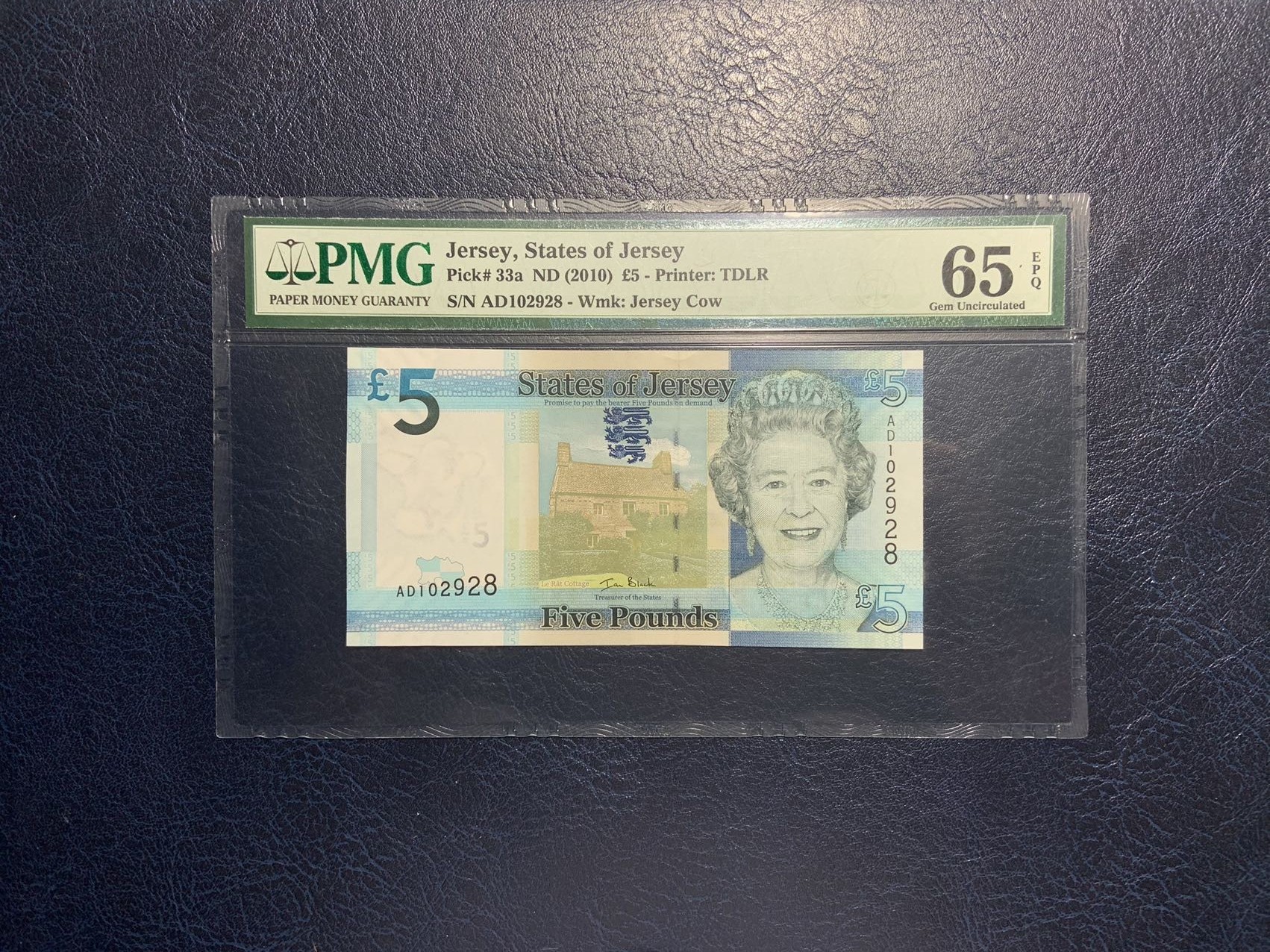 收藏联盟Quantum Auction 第297期拍卖  泽西岛2010年5镑 PMG65 号码无3457朦胧号