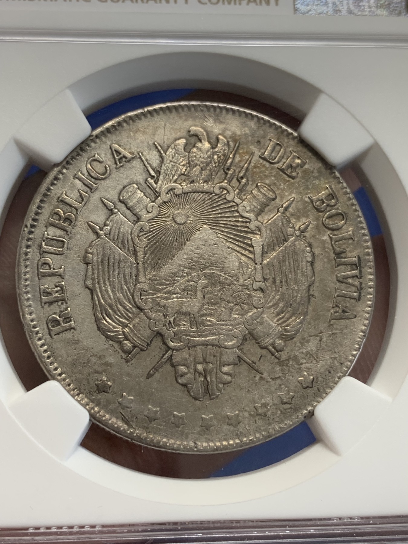 《竞宝斋》第207场-周日，周一 2场 (全场包邮) NGC AUD  1872  玻利维亚1玻利瓦尔银币 热门南美大银 带彩包浆