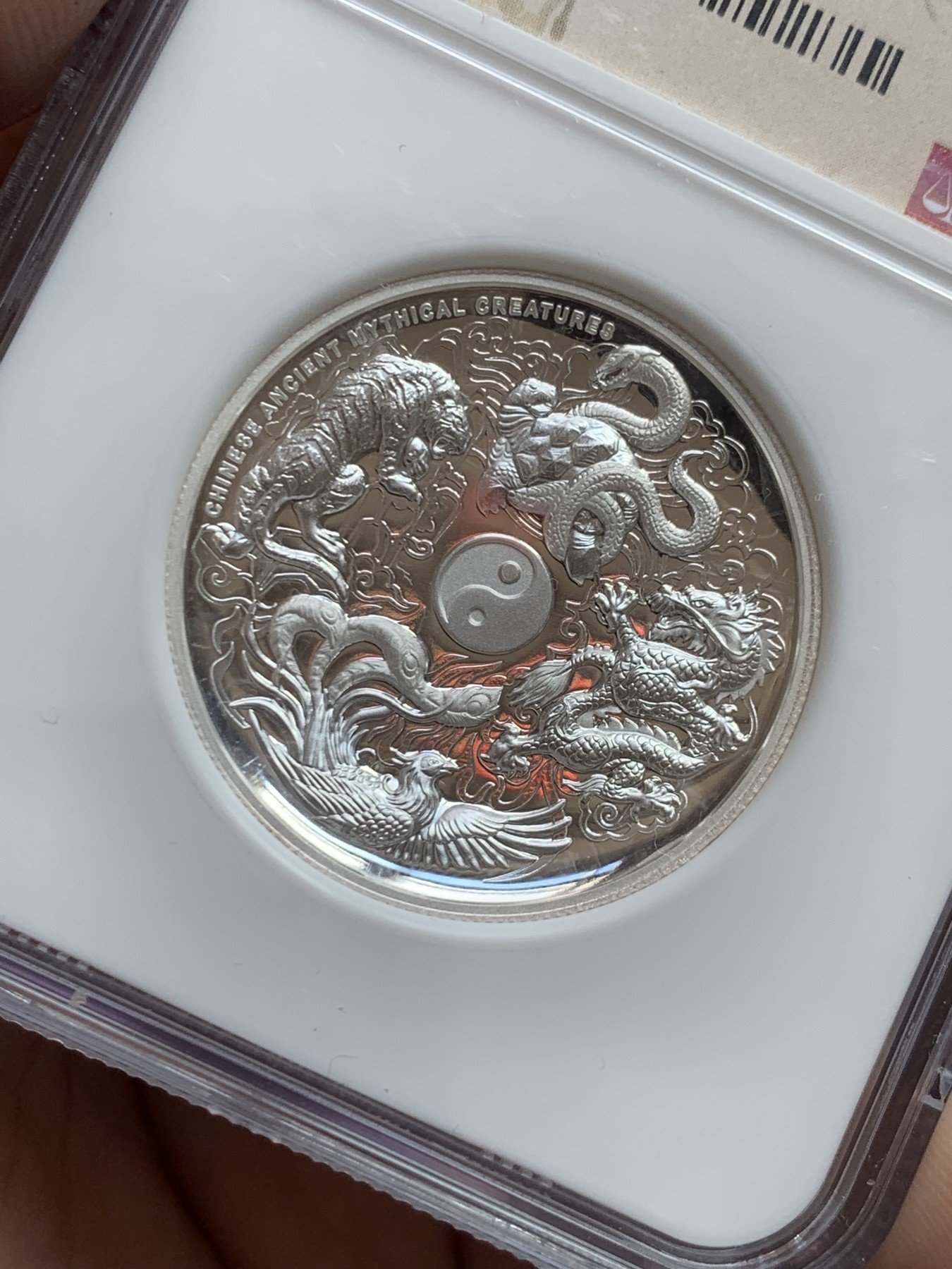 《竞宝斋》第207场-周日，周一 2场 (全场包邮) NGC PF70 Ultra Cameo 2016年图瓦卢1美元纪念银币，中国四大神兽题材，超高浮雕凹形镜面工艺精美绝伦，加厚盒封装特殊龙凤标签 盒证齐全！