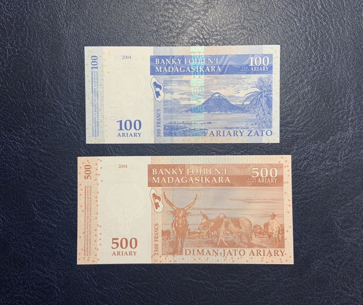 收藏联盟Quantum Auction 第297期拍卖  马达加斯加2004年100-10000法郎一套 号码无4 品相全新UNC（10000面值品相为AU）