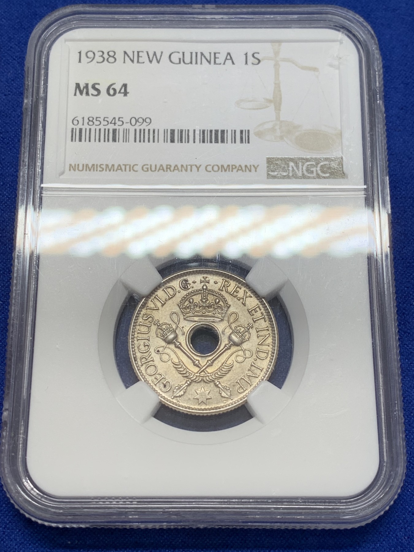 《竞宝斋》第207场-周日，周一 2场 (全场包邮) NGC MS64 英属新几内亚1938年一先令银币 分数不错