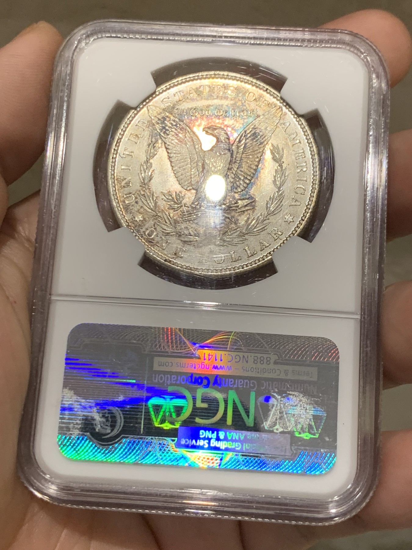 《竞宝斋》第207场-周日，周一 2场 (全场包邮) NGC MS66 美国 1879年S版 摩根1美元 大银币 淡彩十字光 状态非常好，带Stack's 收藏标签 很有意义