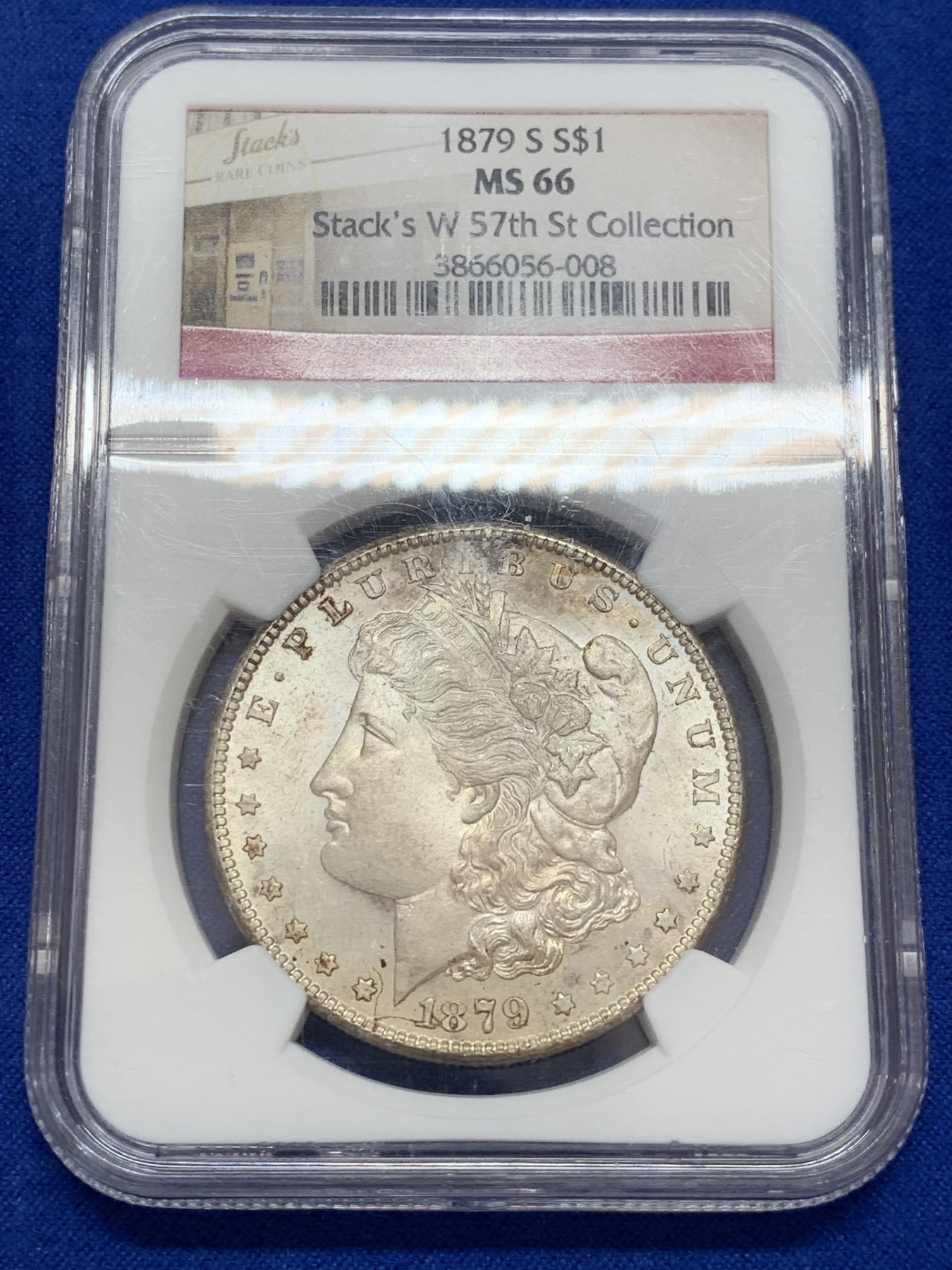 《竞宝斋》第207场-周日，周一 2场 (全场包邮) NGC MS66 美国 1879年S版 摩根1美元 大银币 淡彩十字光 状态非常好，带Stack's 收藏标签 很有意义