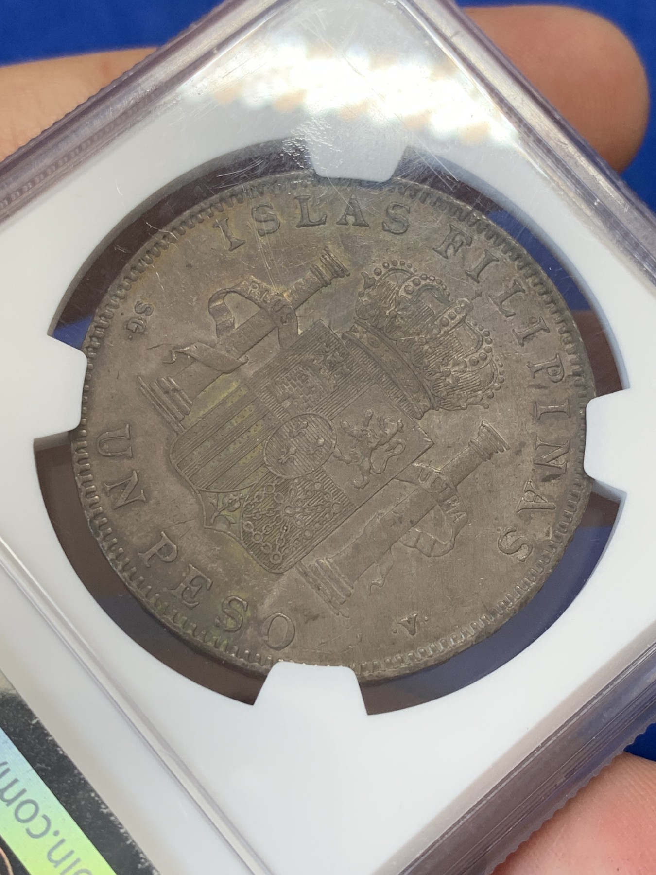 《竞宝斋》第207场-周日，周一 2场 (全场包邮) NGC AU53 西属菲律宾1897年阿方索十三世1比索银币，皮蛋包浆