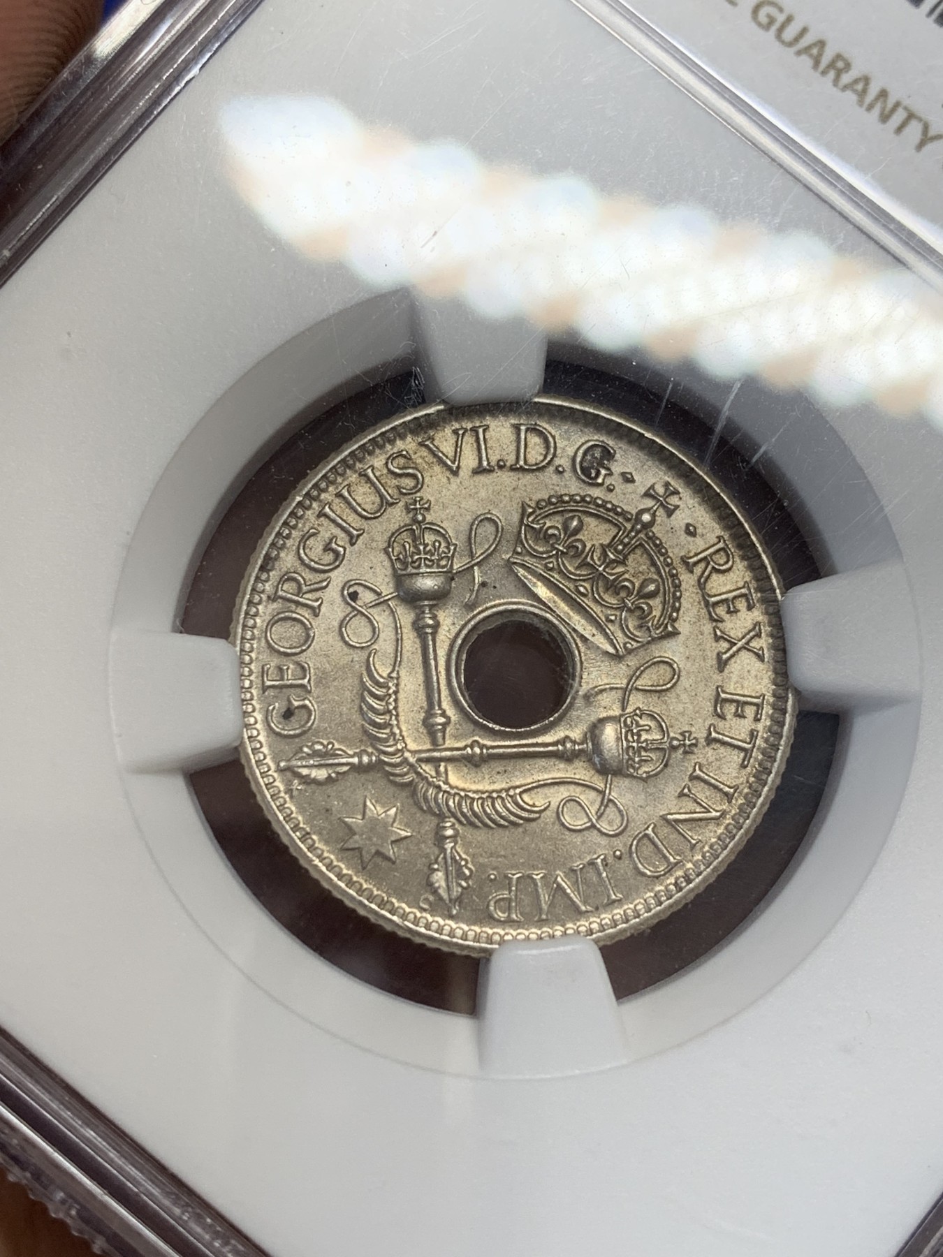 《竞宝斋》第207场-周日，周一 2场 (全场包邮) NGC MS64 英属新几内亚1938年一先令银币 分数不错