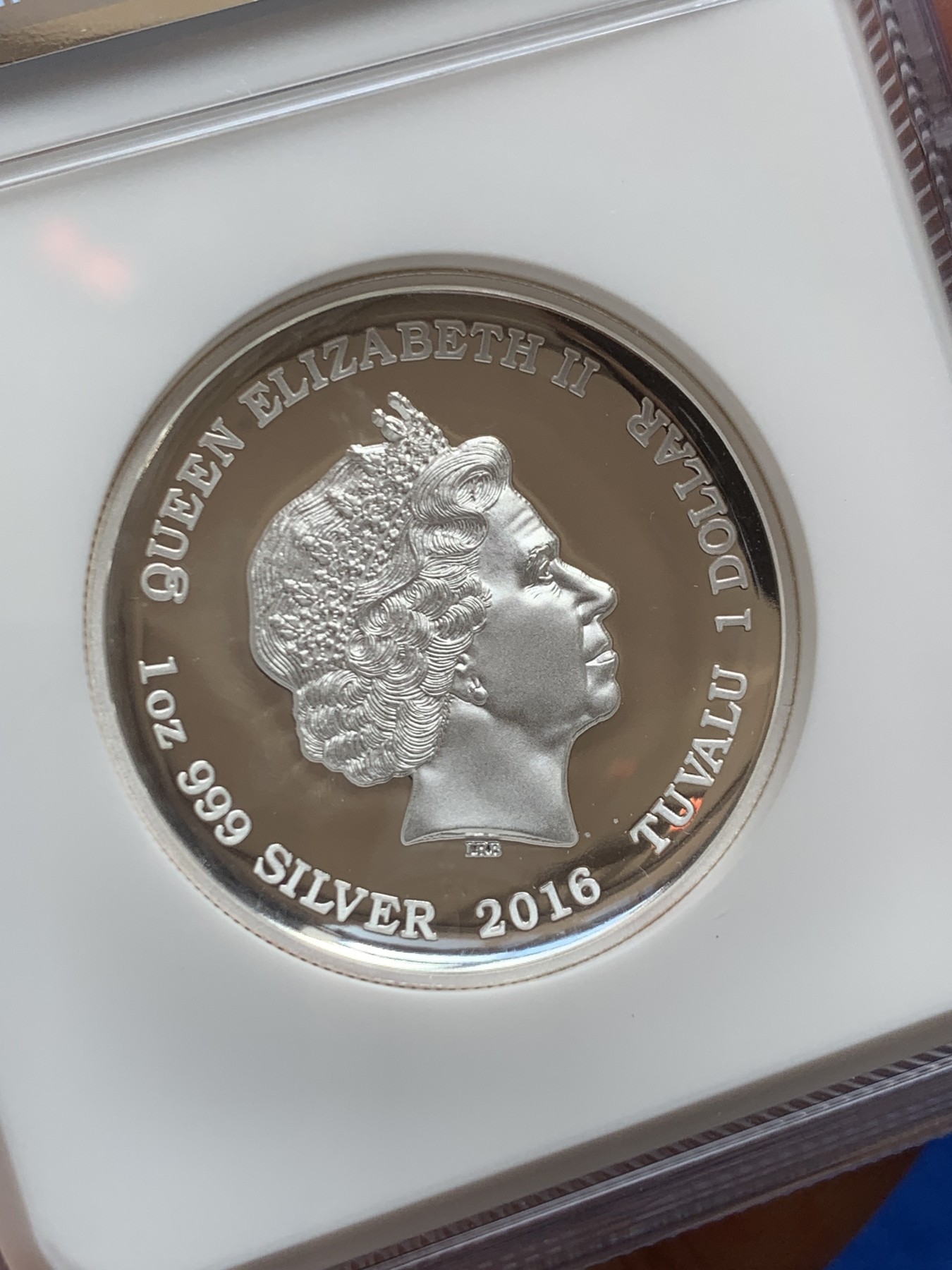 《竞宝斋》第207场-周日，周一 2场 (全场包邮) NGC PF70 Ultra Cameo 2016年图瓦卢1美元纪念银币，中国四大神兽题材，超高浮雕凹形镜面工艺精美绝伦，加厚盒封装特殊龙凤标签 盒证齐全！