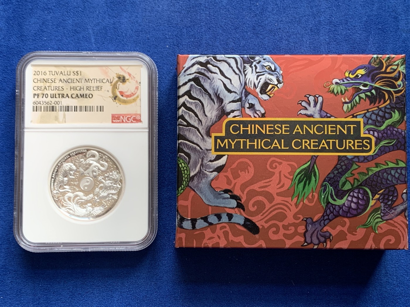 《竞宝斋》第207场-周日，周一 2场 (全场包邮) NGC PF70 Ultra Cameo 2016年图瓦卢1美元纪念银币，中国四大神兽题材，超高浮雕凹形镜面工艺精美绝伦，加厚盒封装特殊龙凤标签 盒证齐全！