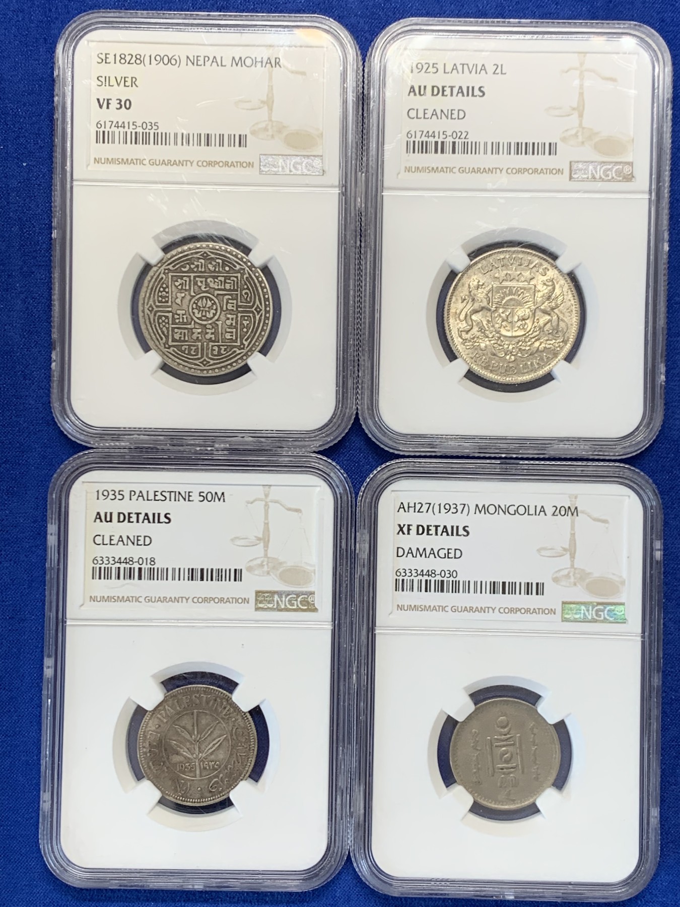 《竞宝斋》第207场-周日，周一 2场 (全场包邮) 4枚1组 NGC-AU拉脱维亚1925年2拉特银币，NGC-AU巴勒斯坦1935年50米尔银币，NGC-XF蒙古1937年20蒙戈镍币，NGC-VF30尼泊尔1906年莫哈银币，