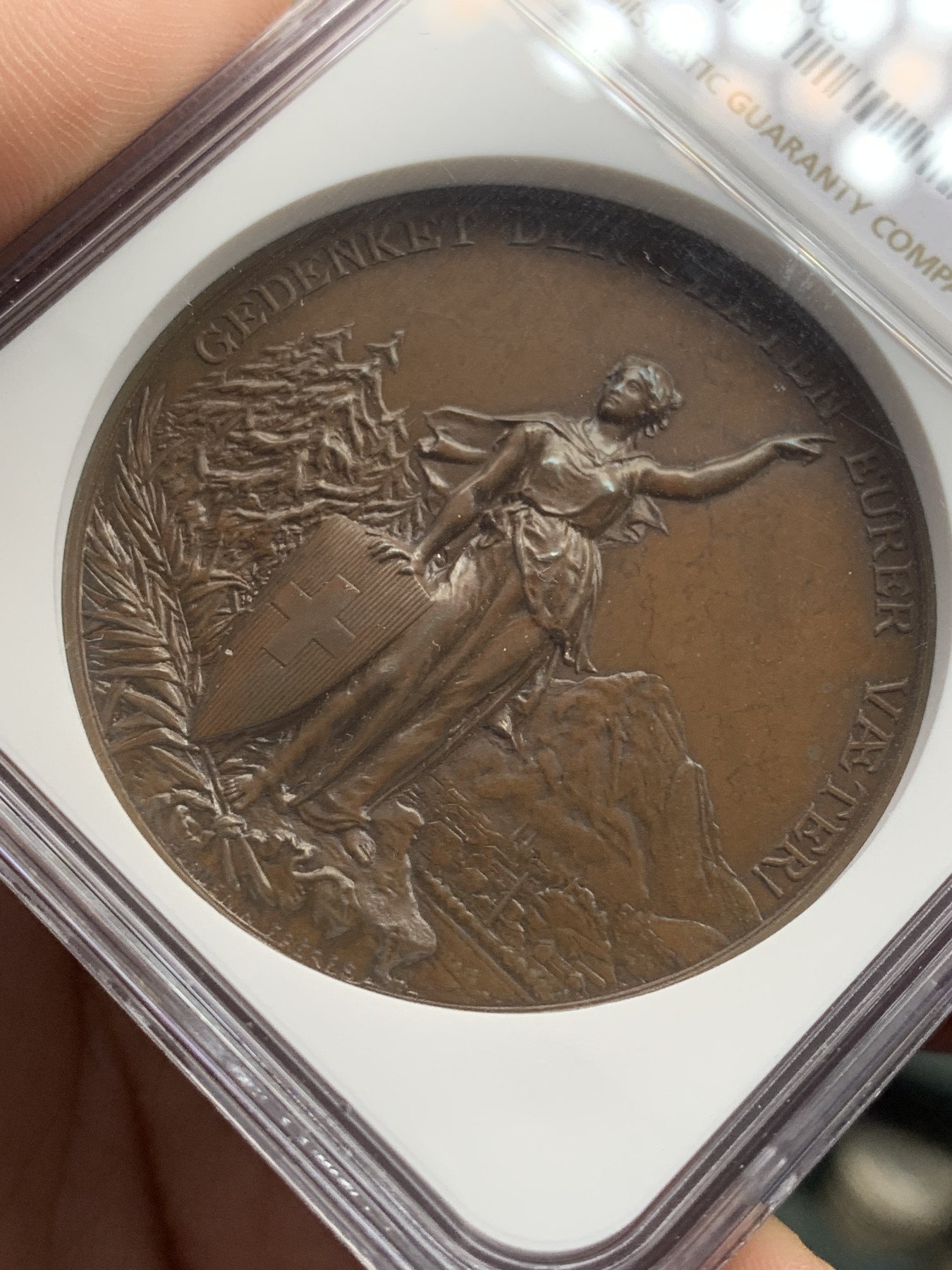 《竞宝斋》第207场-周日，周一 2场 (全场包邮) NGC MS64BN 1892年瑞士格拉鲁斯射击节高浮雕铜章 原味巧克力包浆 顶级品相状态